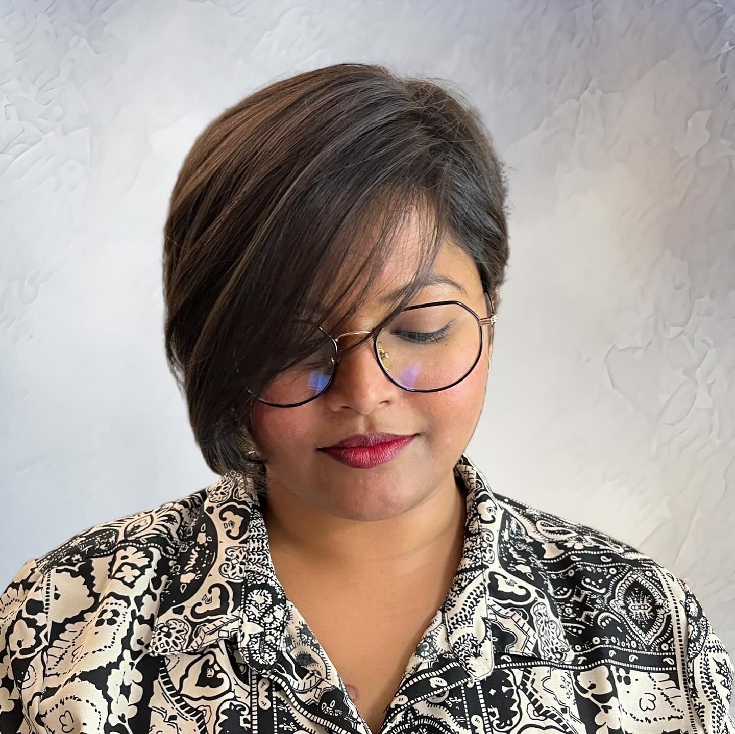 Sleek Asymmetrical Bob with Side-Swept Bangs