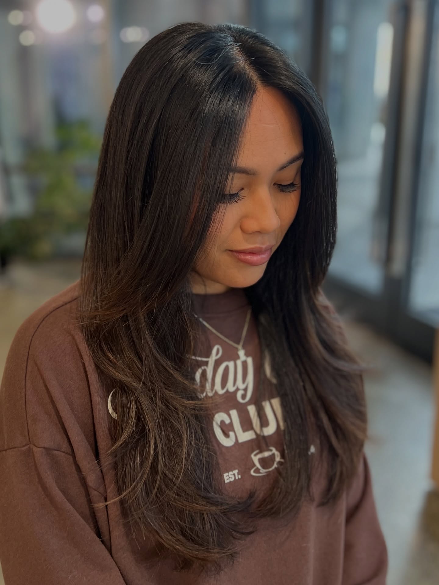 Sleek Long Layered Cut with Subtle Movement