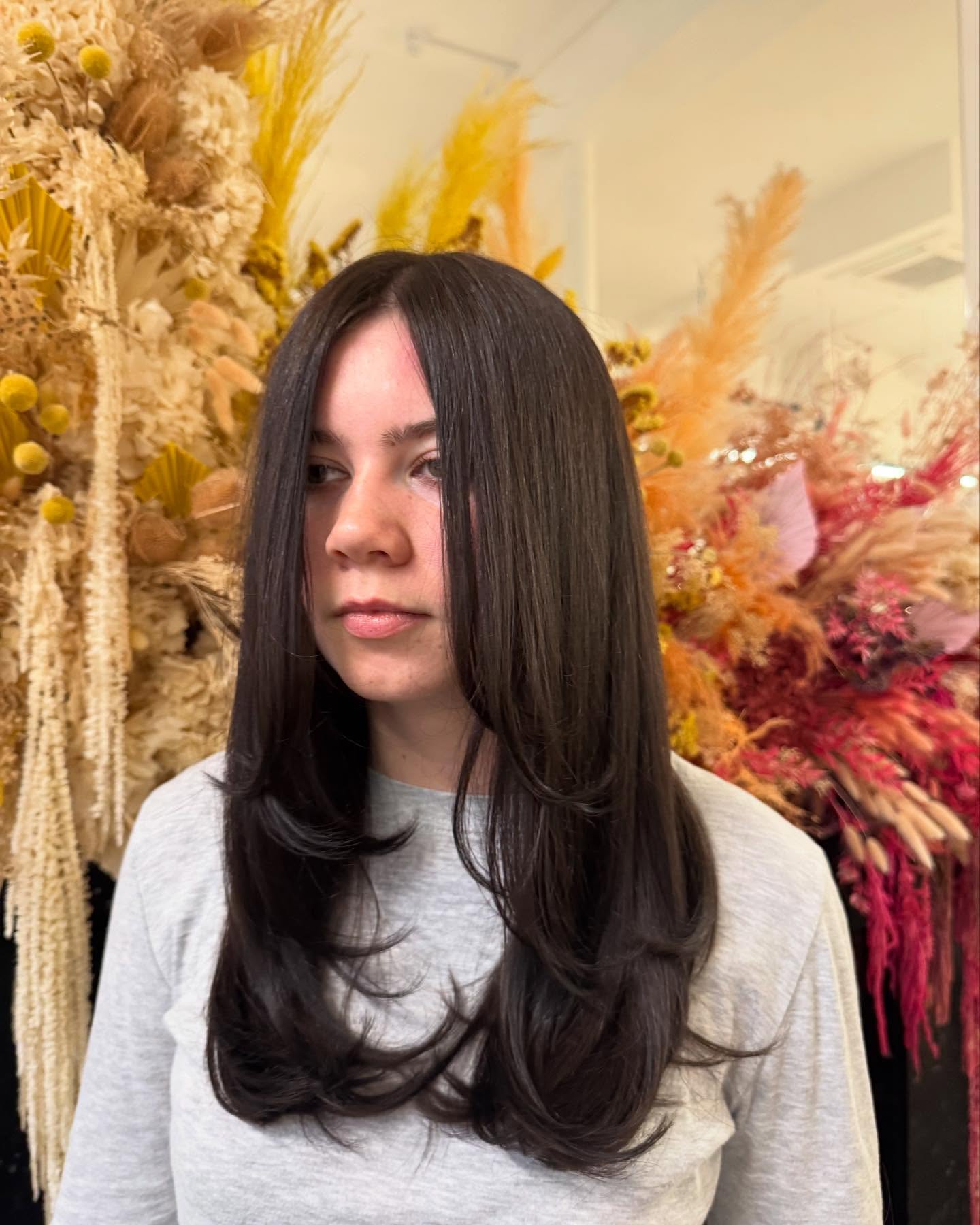 Sleek Long Layers with Soft Face-Framing Pieces