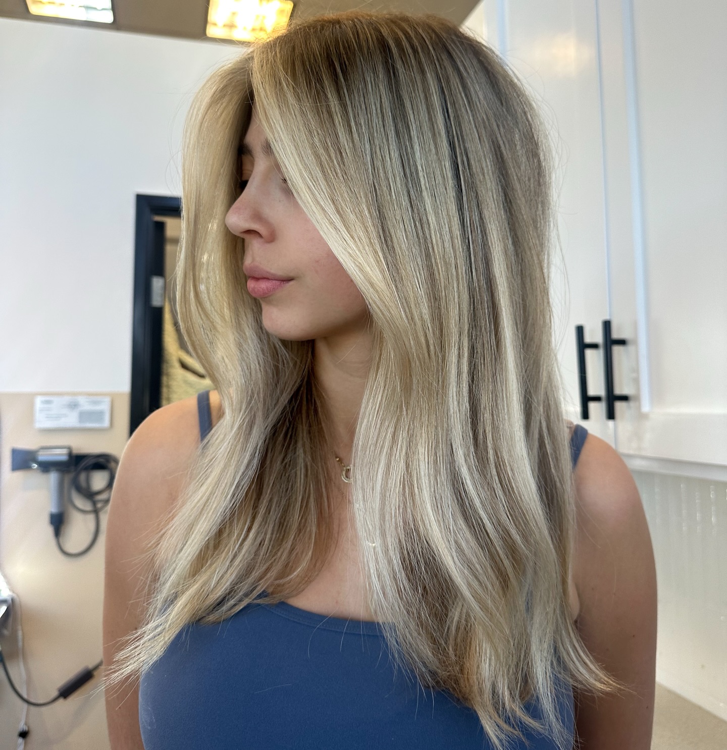 Soft Ash Blonde Balayage with Subtle Highlights