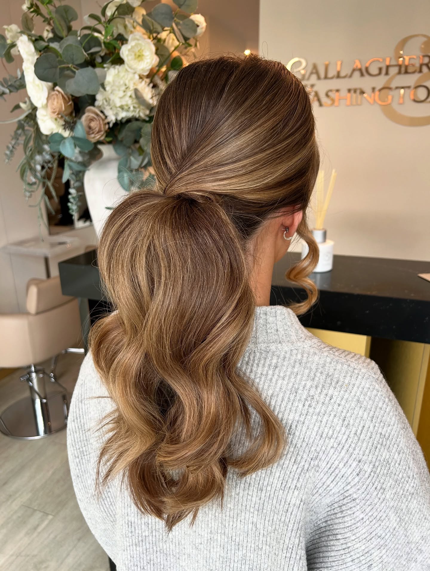 Softly Curled Low Ponytail with Subtle Highlights