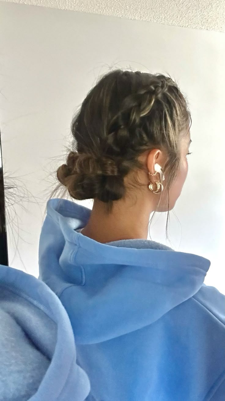Stylish Braided Low Bun with Textured Finish