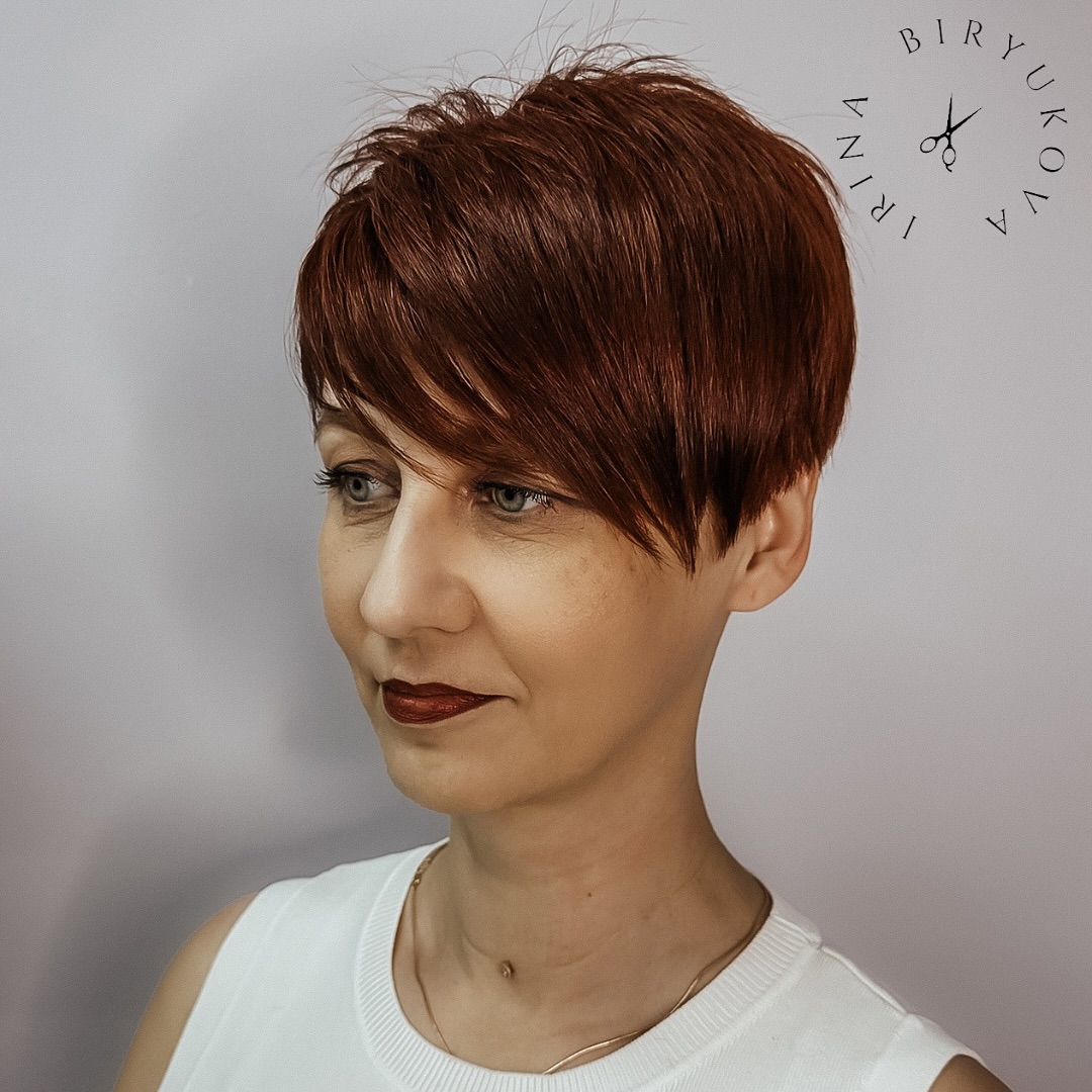 Stylish Copper-Red Pixie Cut with Angular Layers
