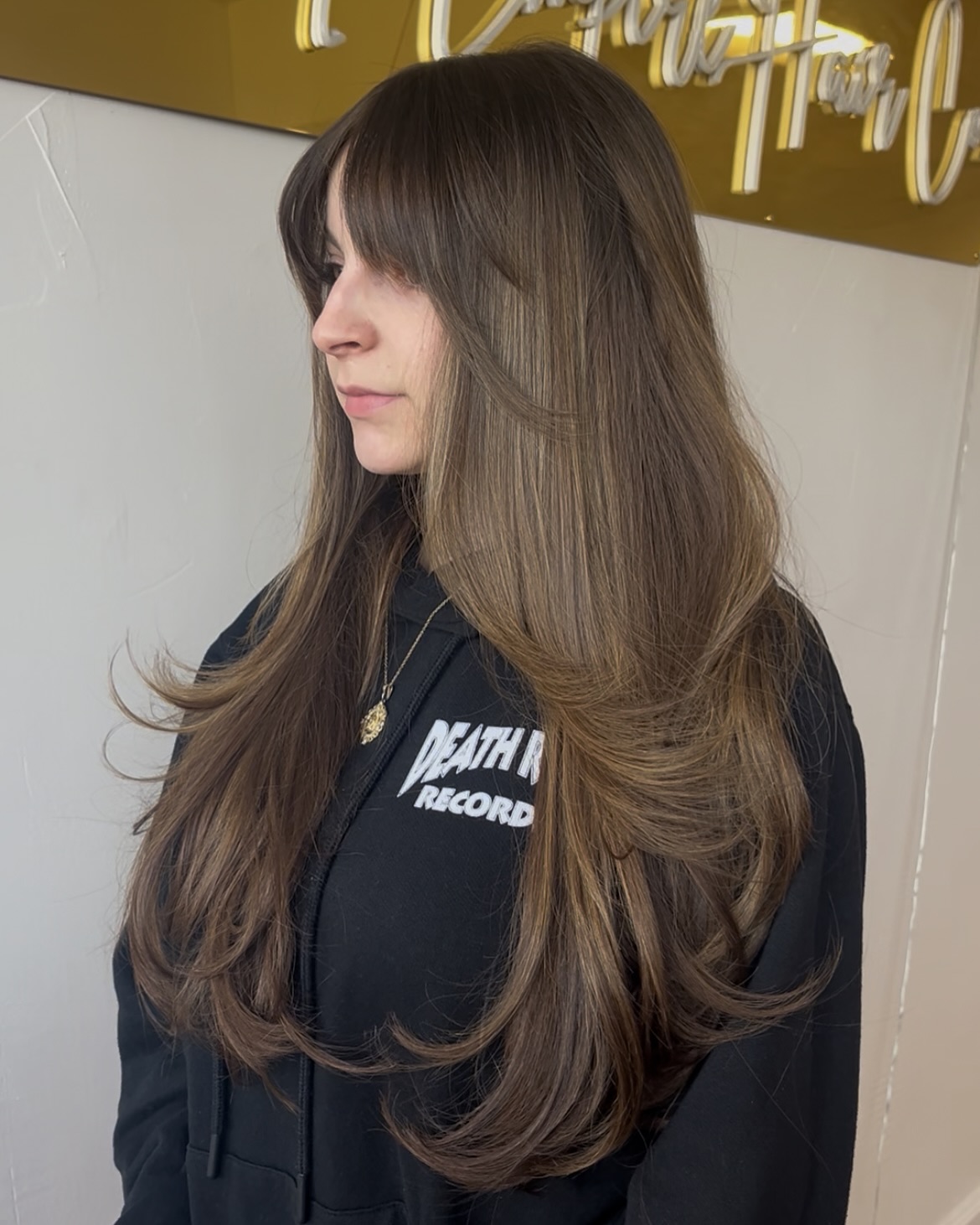 Stylish Long Layered Cut with Soft Face-Framing Bangs