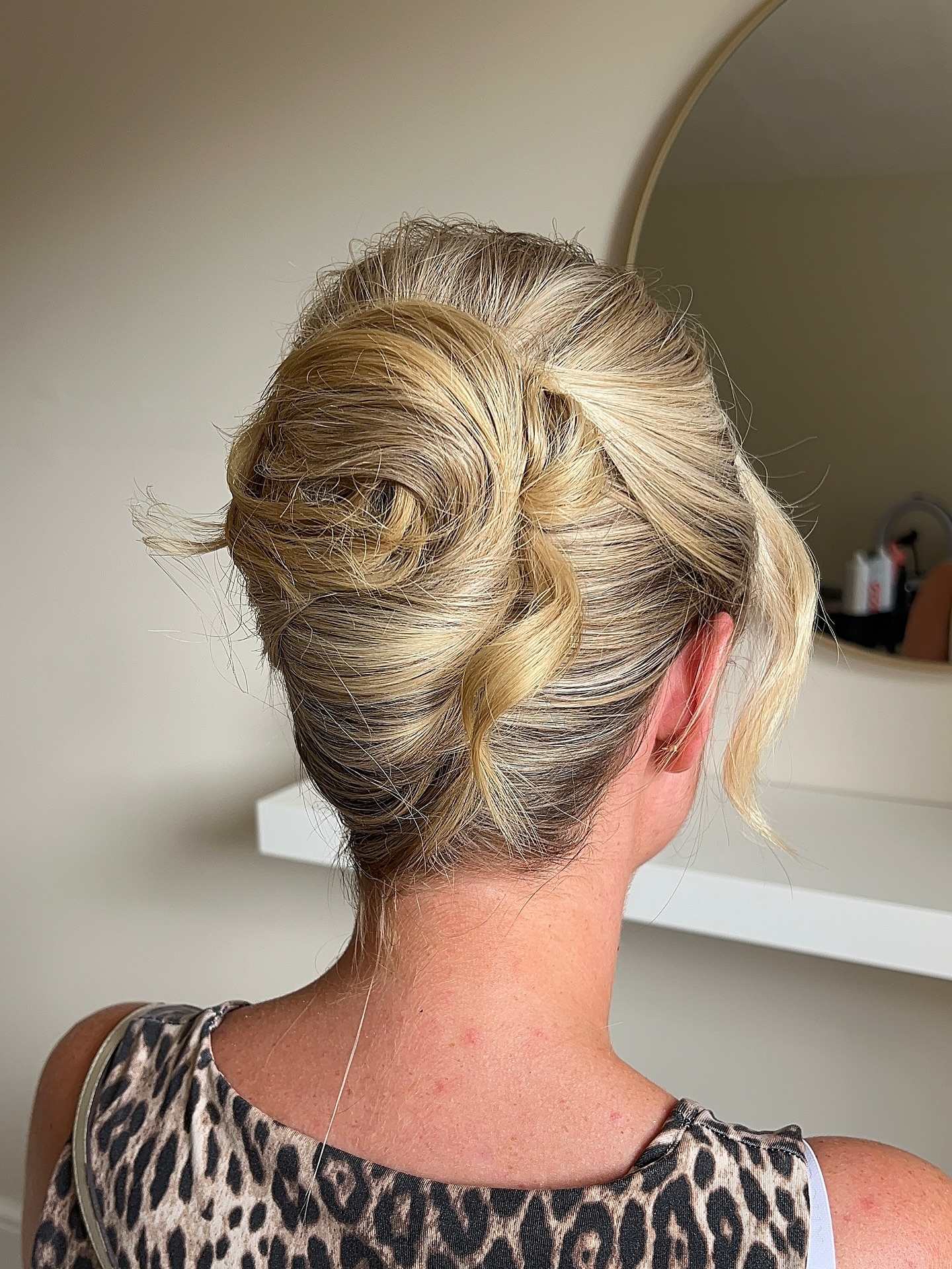 Stylish Twisted Low Updo with Soft Tails