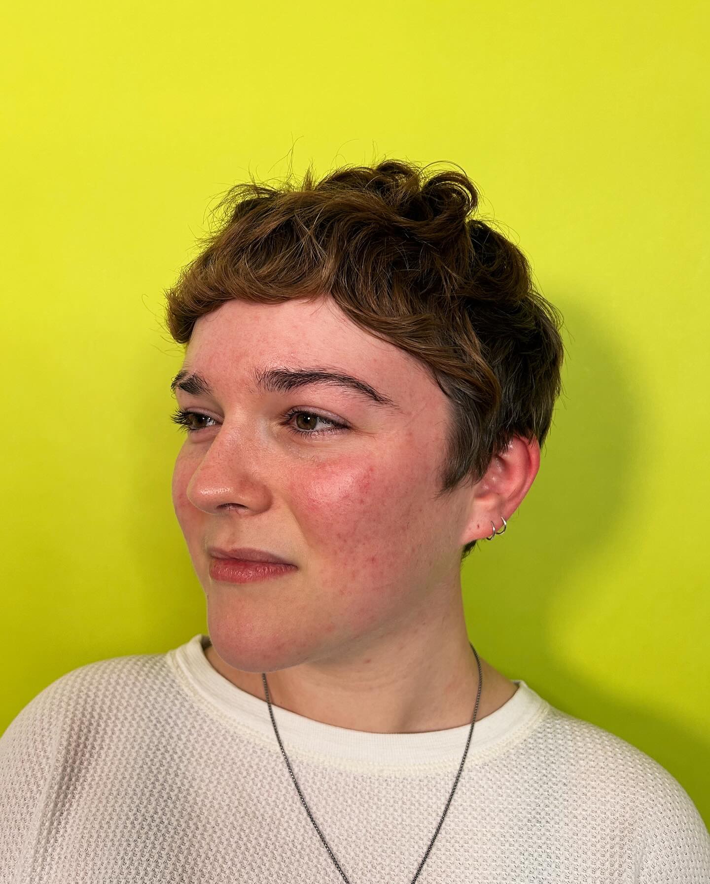 Textured Curly Pixie Cut with Soft Bangs