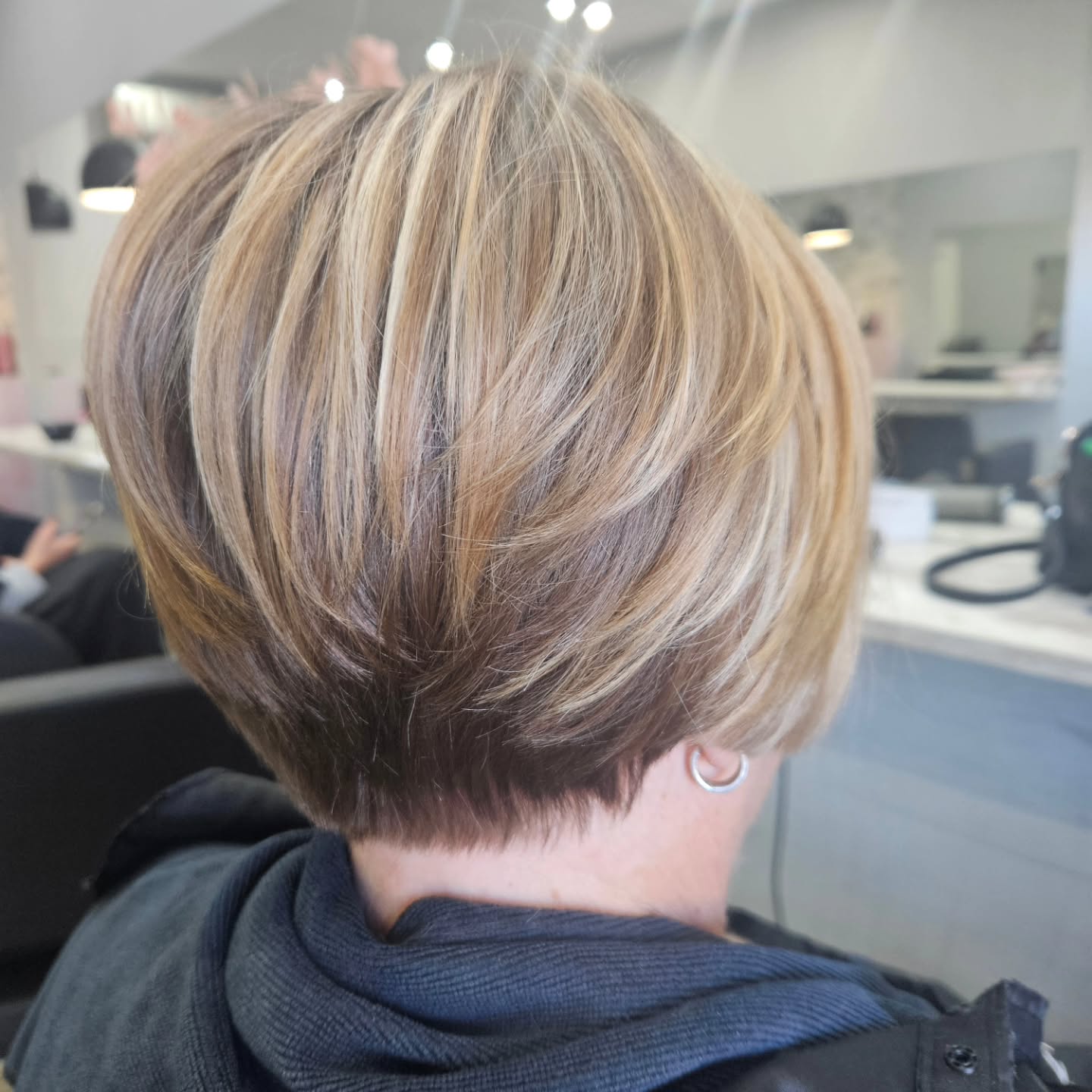 Textured Feathered Bob with Subtle Highlights