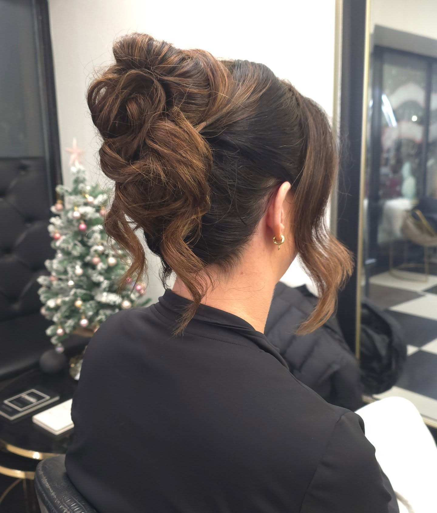 Textured High Bun with Soft Tendrils