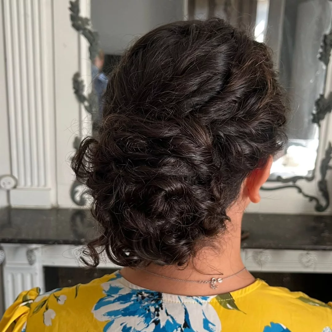 Textured Twisted Low Bun for Curly Hair