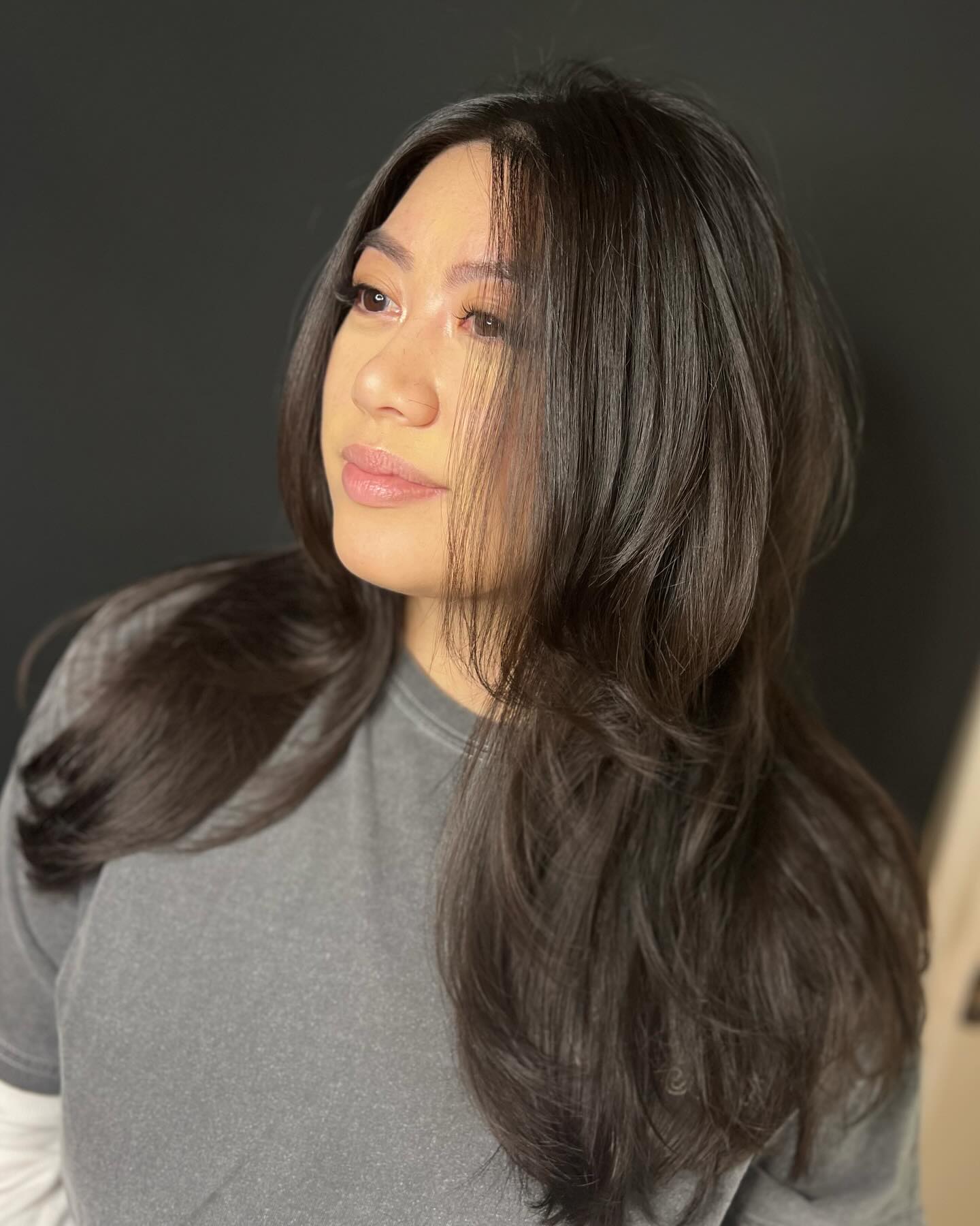 Voluminous Layered Feathered Cut with Subtle Movement
