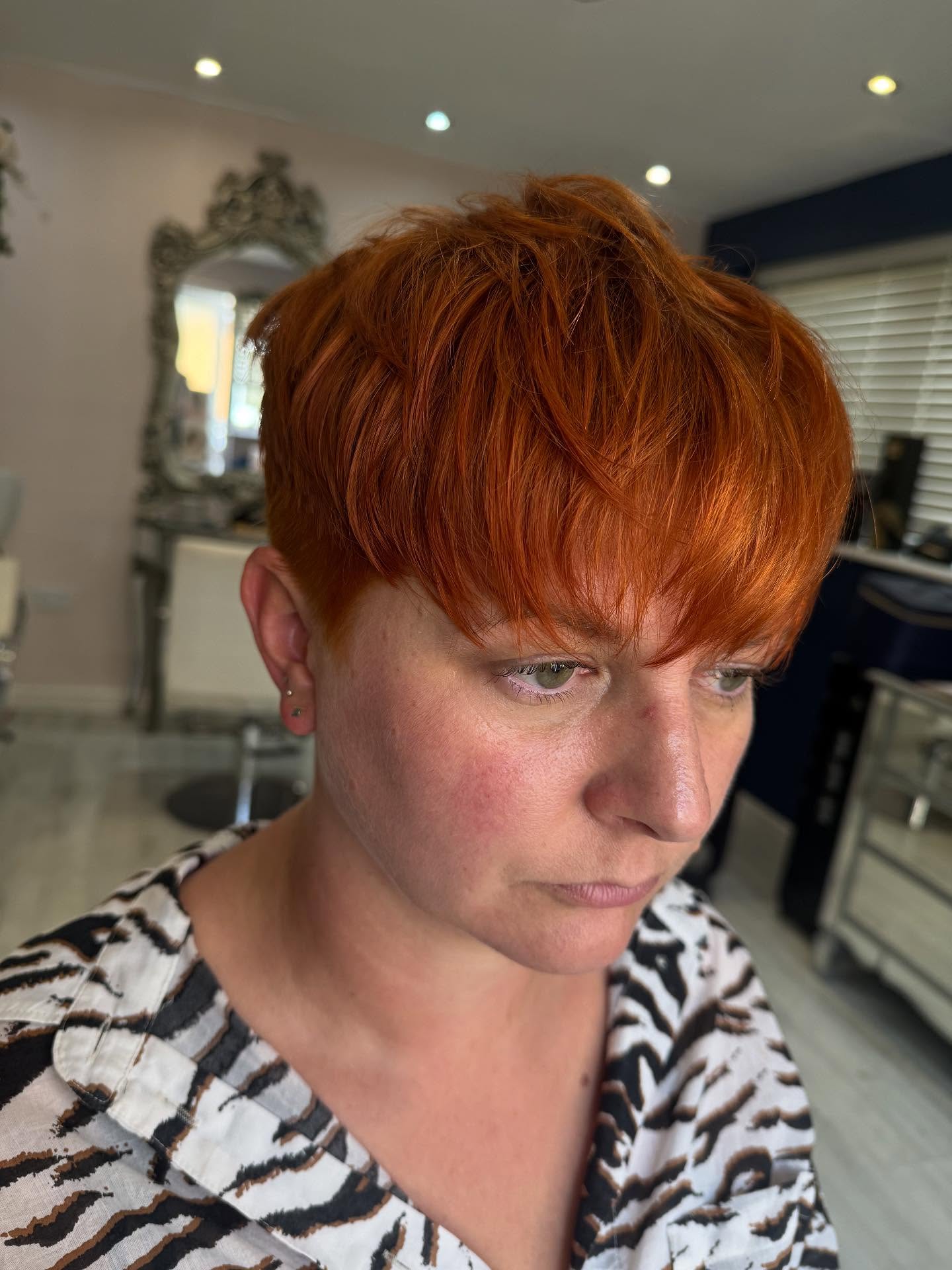 Bold Layered Pixie with Fiery Orange Highlights