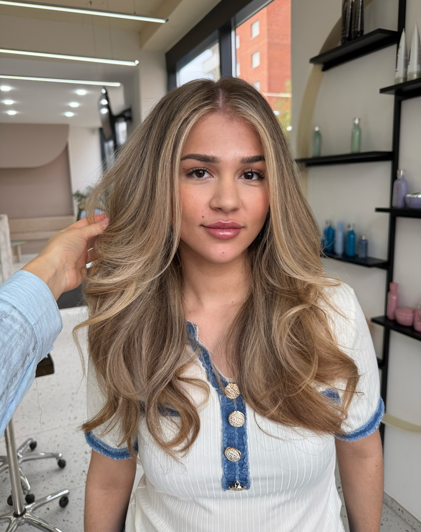 Chic Long Blonde Layered Hair with Soft Volume