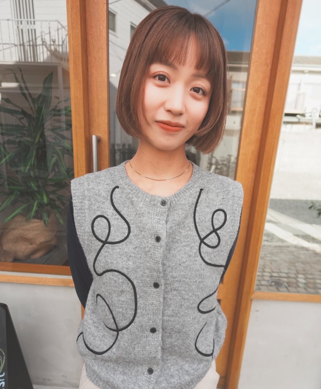 Chic Textured Bob with Soft Blunt Bangs