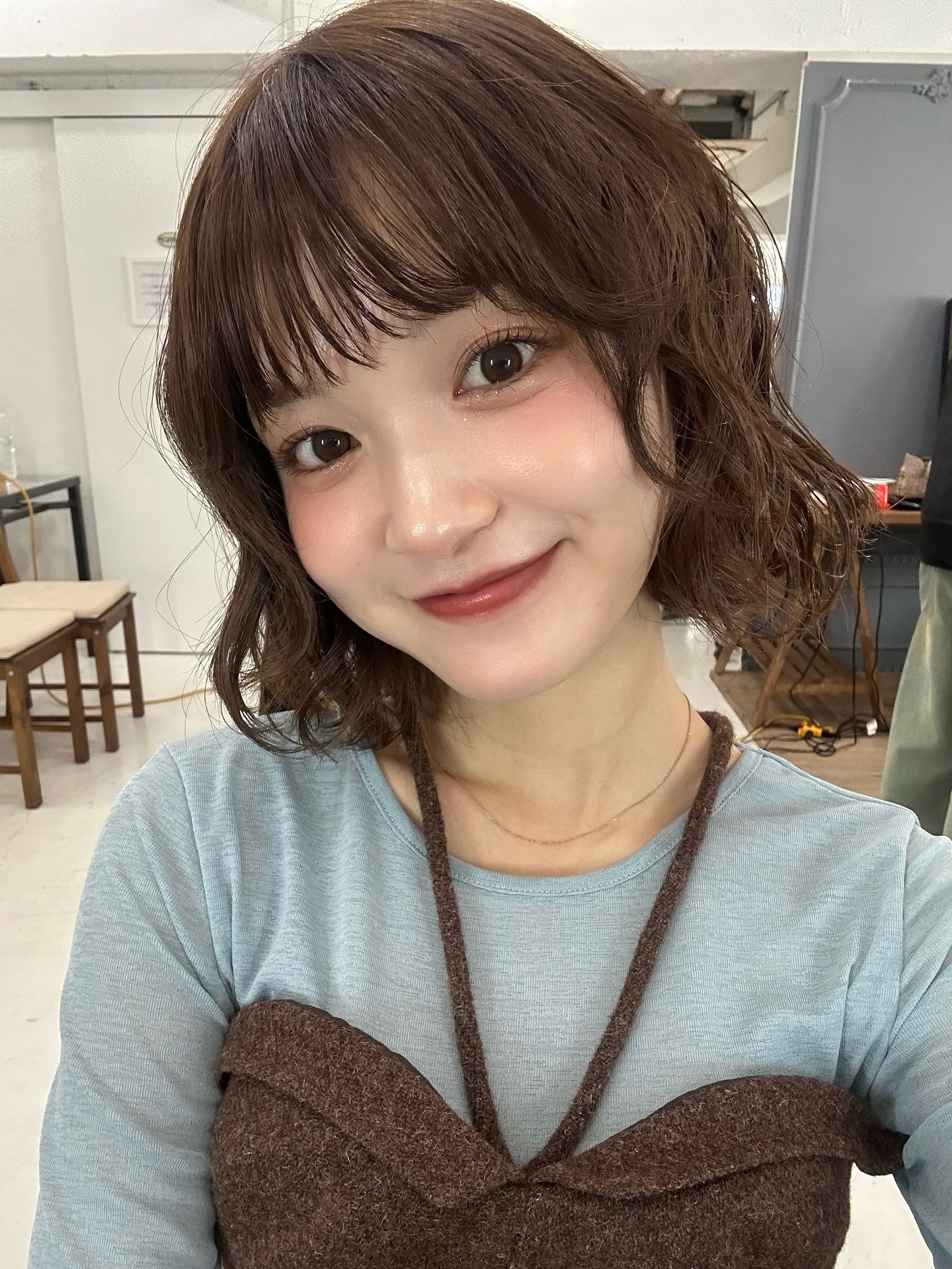 Chic Textured Bob with Soft Waves and Bangs