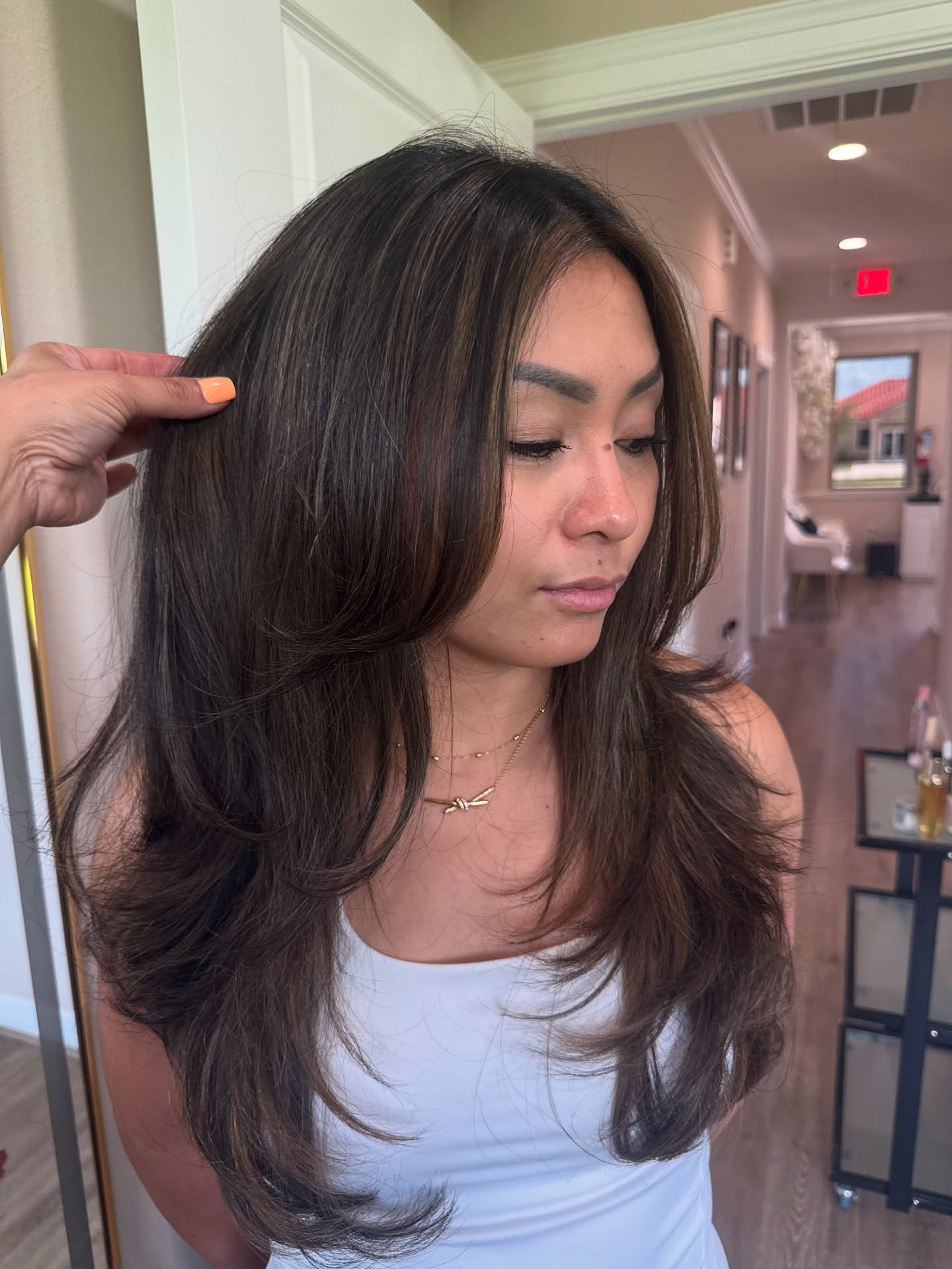 Elegant Long Layered Cut with Subtle Highlights