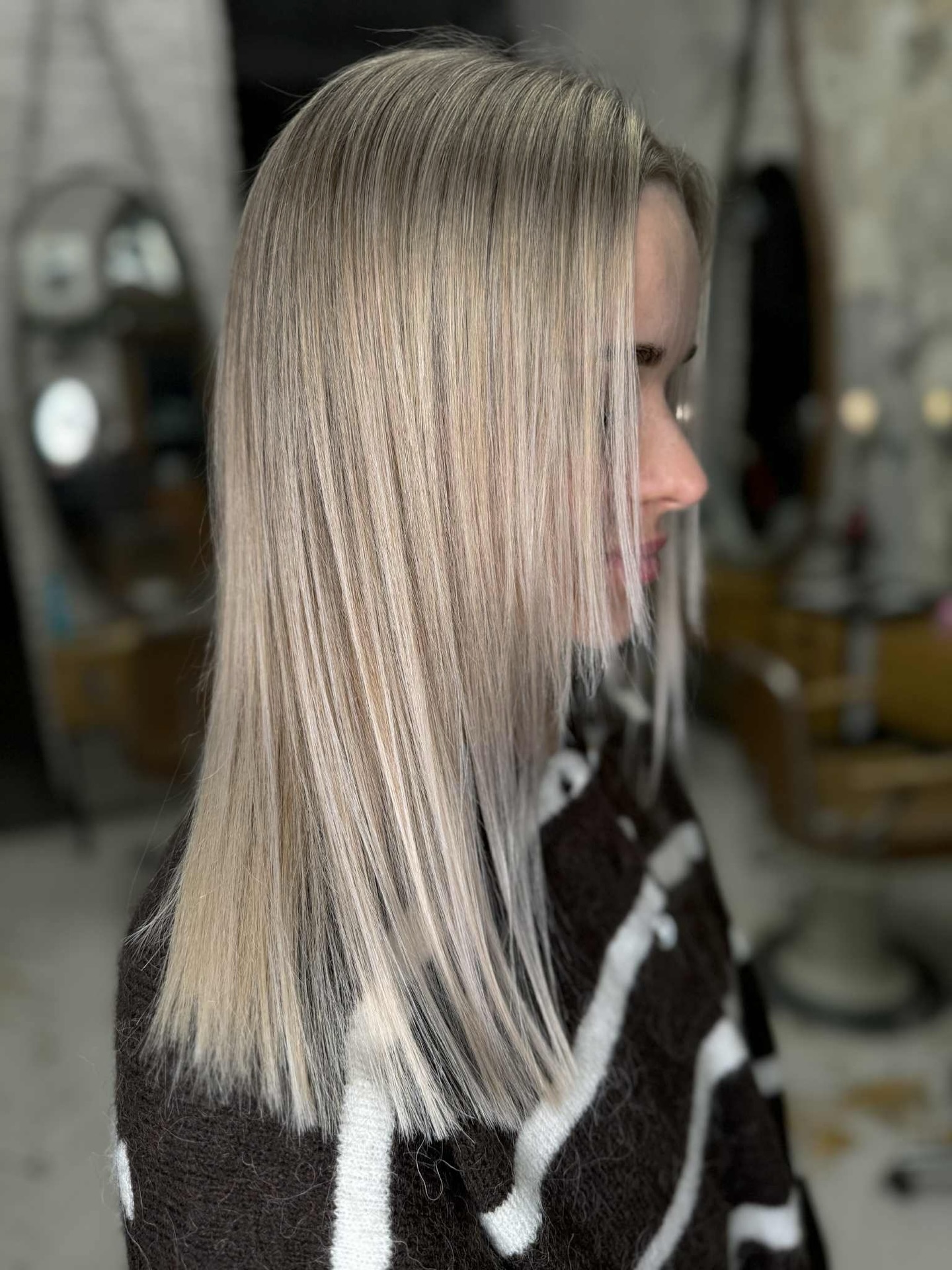 Polished Silky Straight Cut with Subtle Dimension