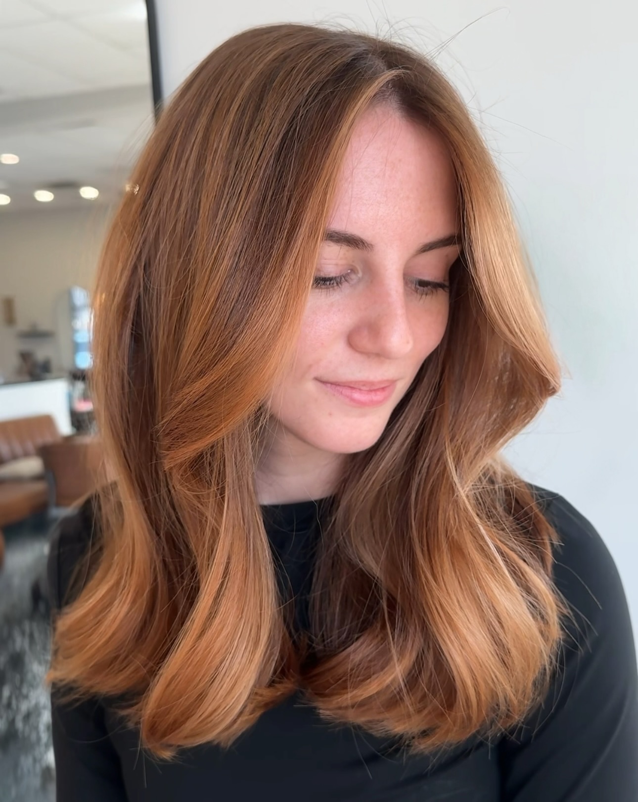 Radiant Warm Blonde Layered Hair with Natural Shine