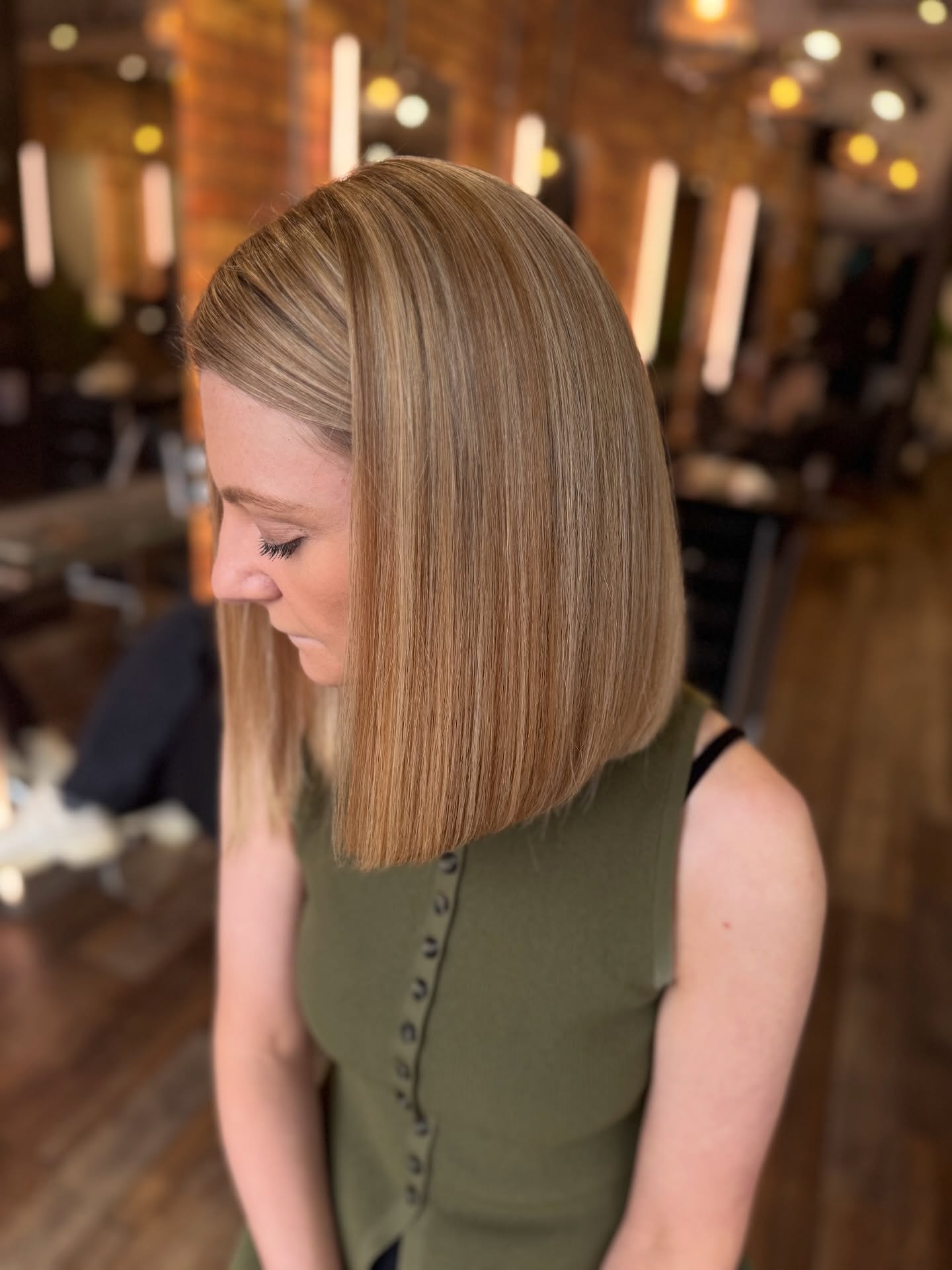 Sleek Blunt Cut with Soft Honey Highlights