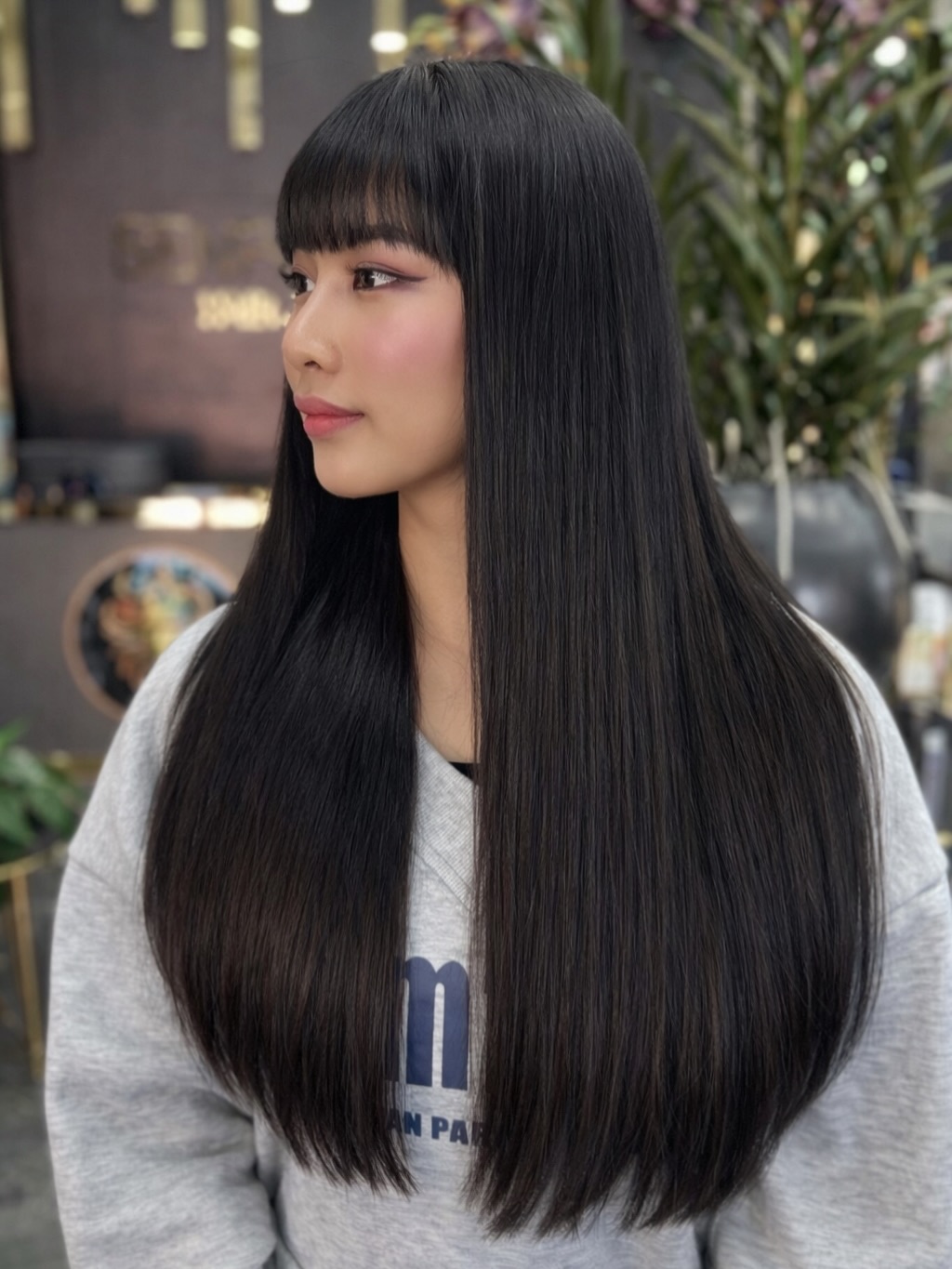 Sleek Long Straight Cut with Chic Bangs