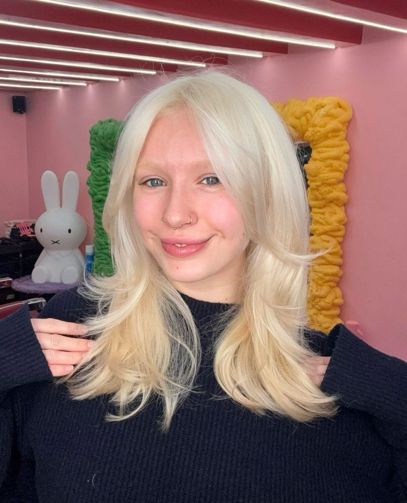 Soft Blonde Layered Hair with Face-Framing Layers