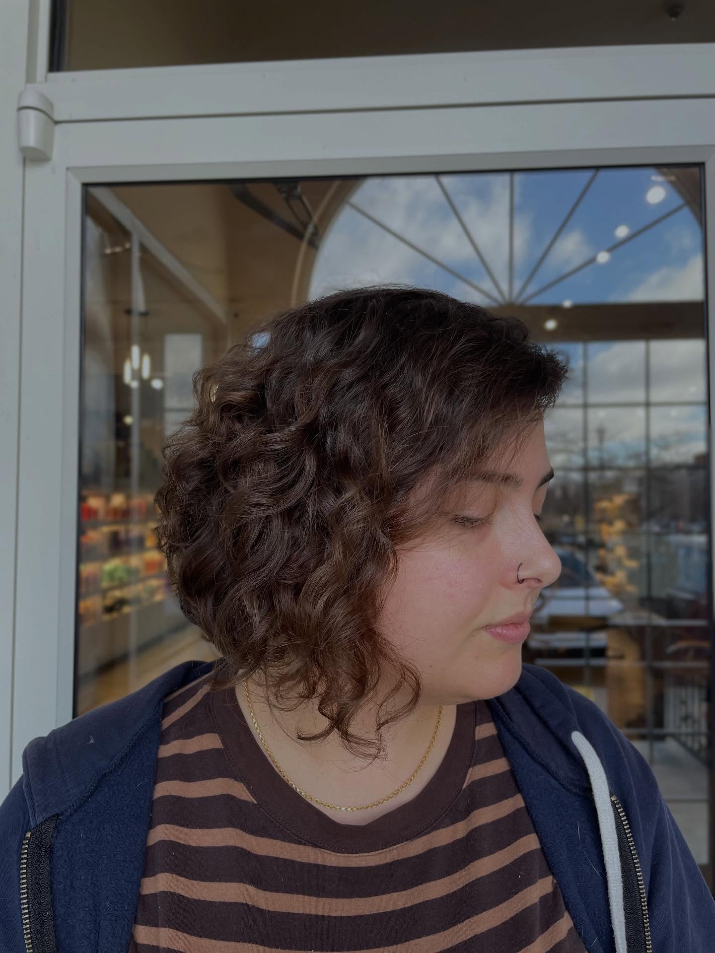 Soft Curly Shoulder-Length Cut with Natural Waves