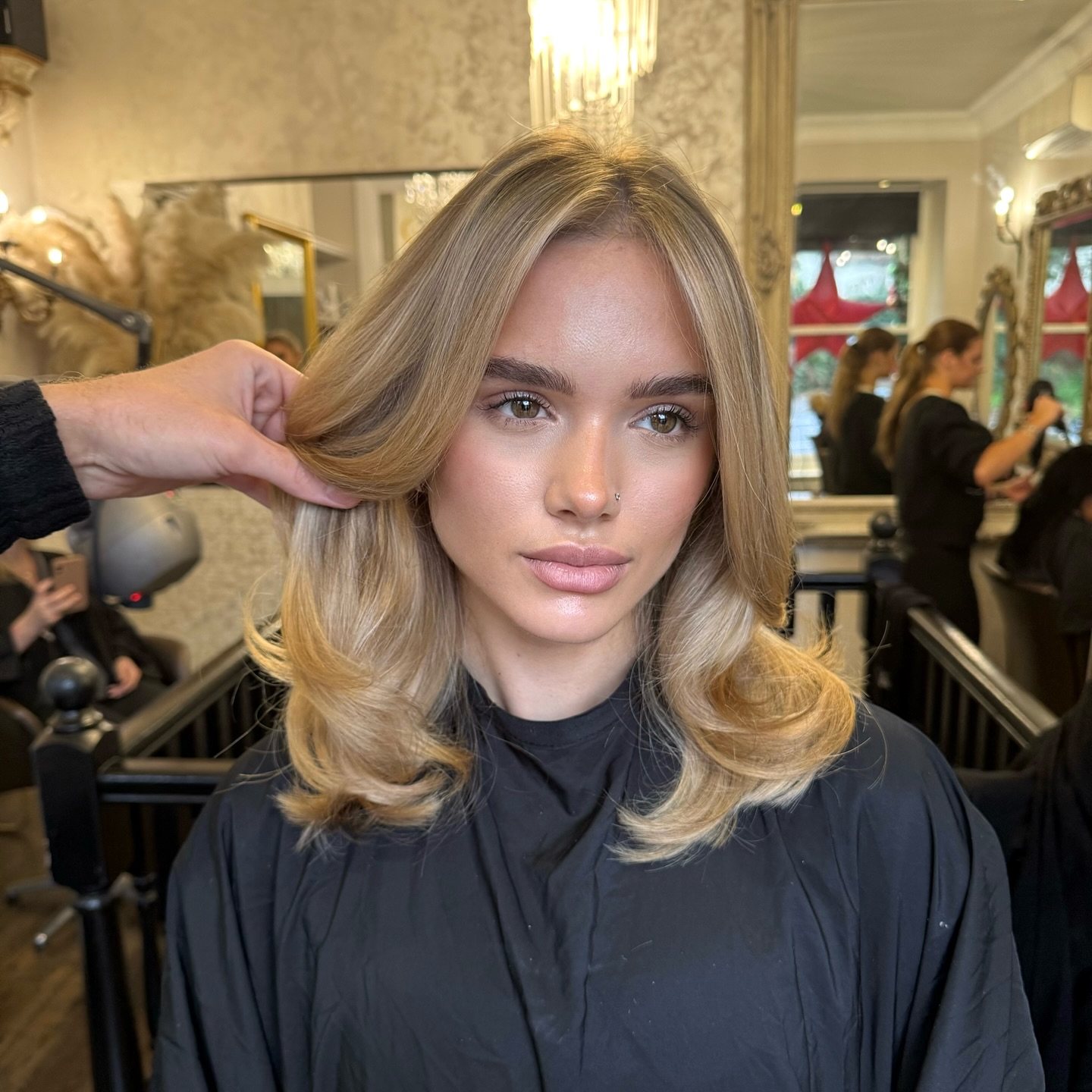 Sun-Kissed Layered Blonde Hair with Soft Curls