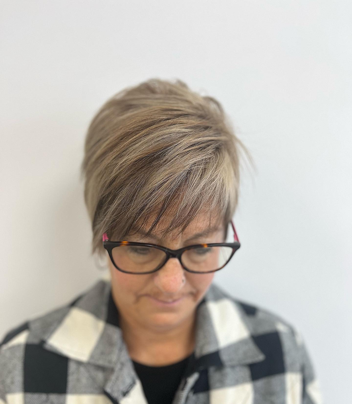 Textured Ash Blonde Layered Pixie with Soft Bangs