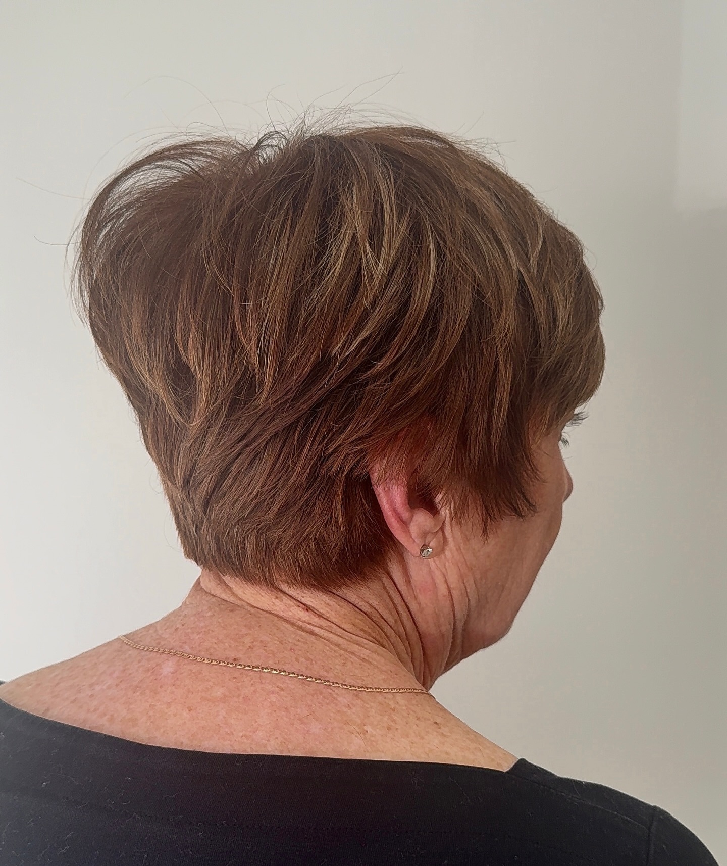 Textured Auburn Layered Pixie with Lively Volume