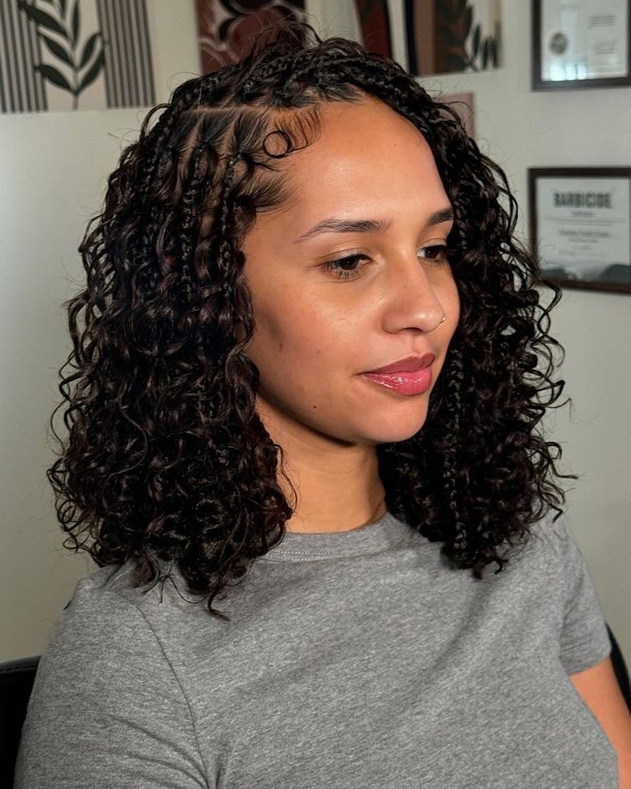 Textured Curly Shoulder-Length Cut with Intricate Braids