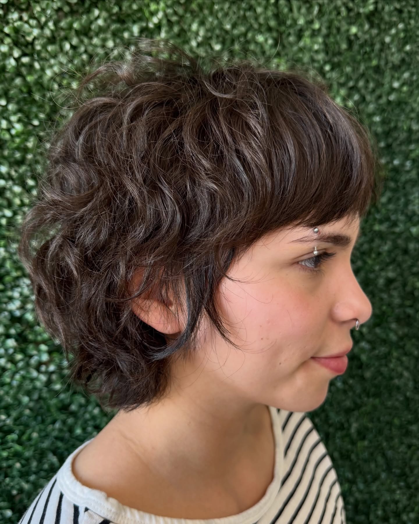 Textured Long Pixie Cut with Defined Curls
