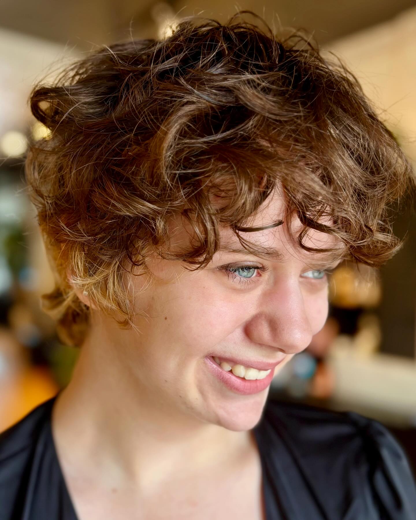 Textured Long Pixie Cut with Soft Curls