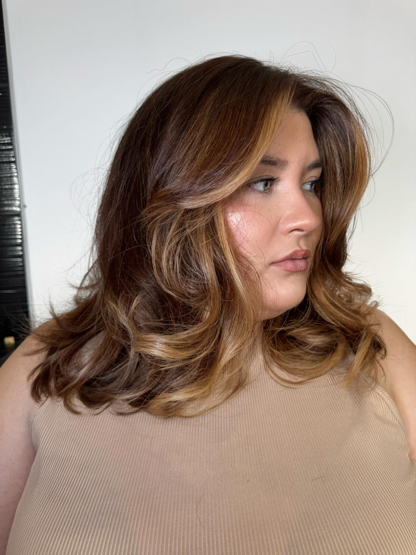 Warm-Toned Textured Long Bob with Soft Volume