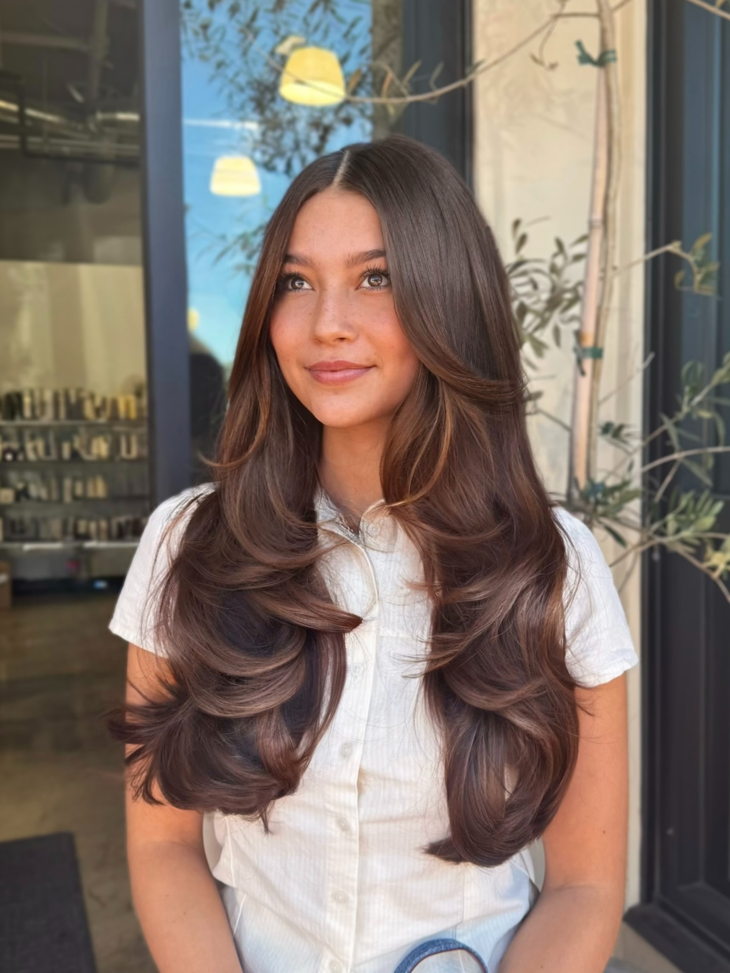 Luscious Long Layered Haircut with Warm Face Framing