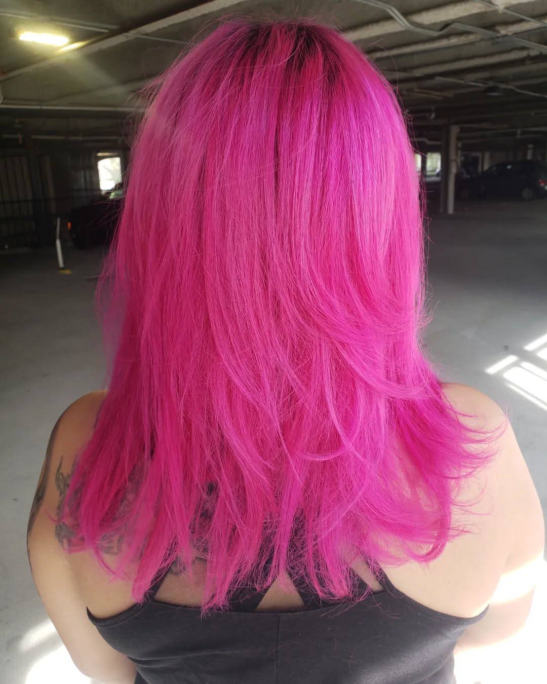 Radiant Long Layered Hot Pink Hair with Textured Ends