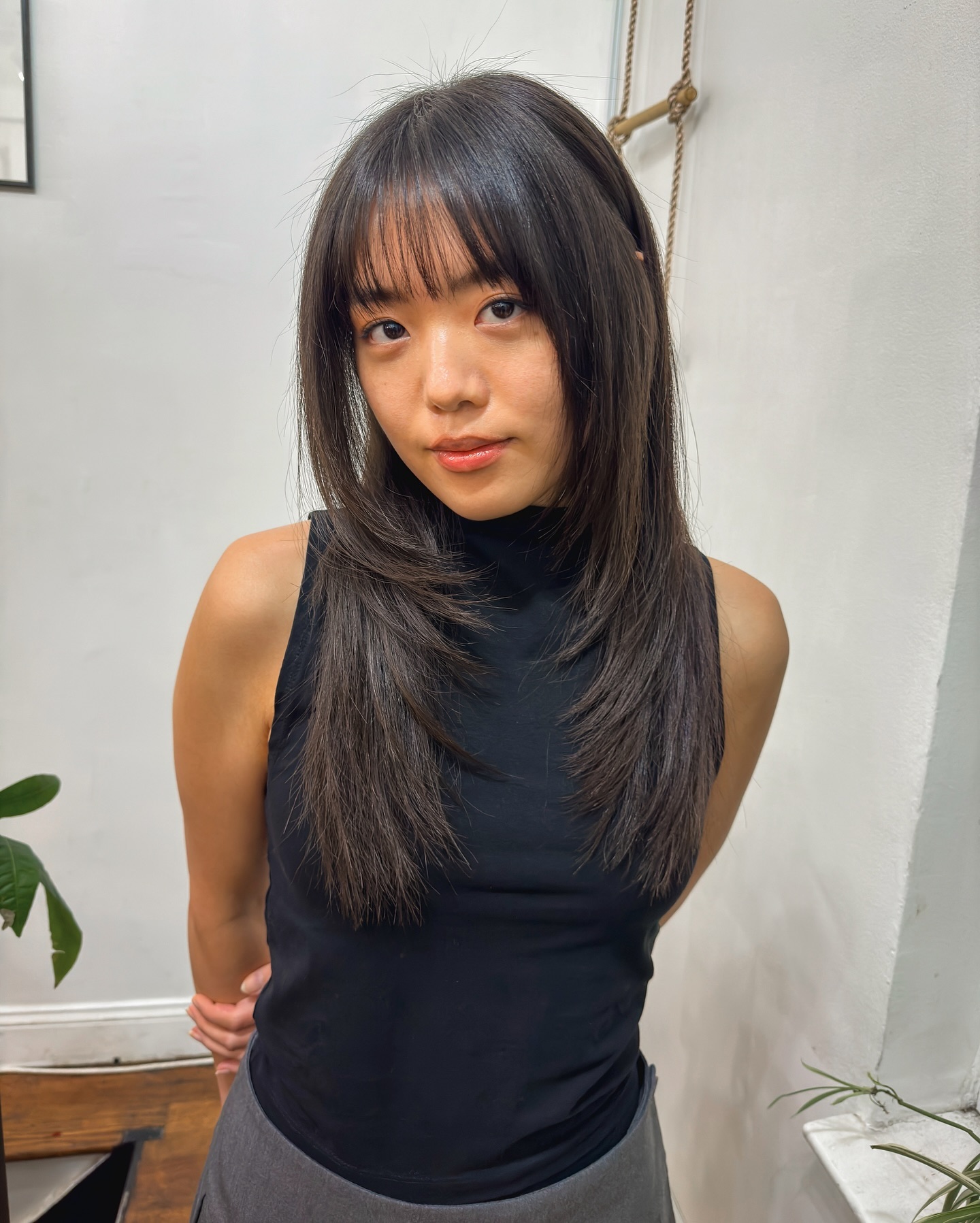 Chic Layered Cut with Face-Framing Bangs