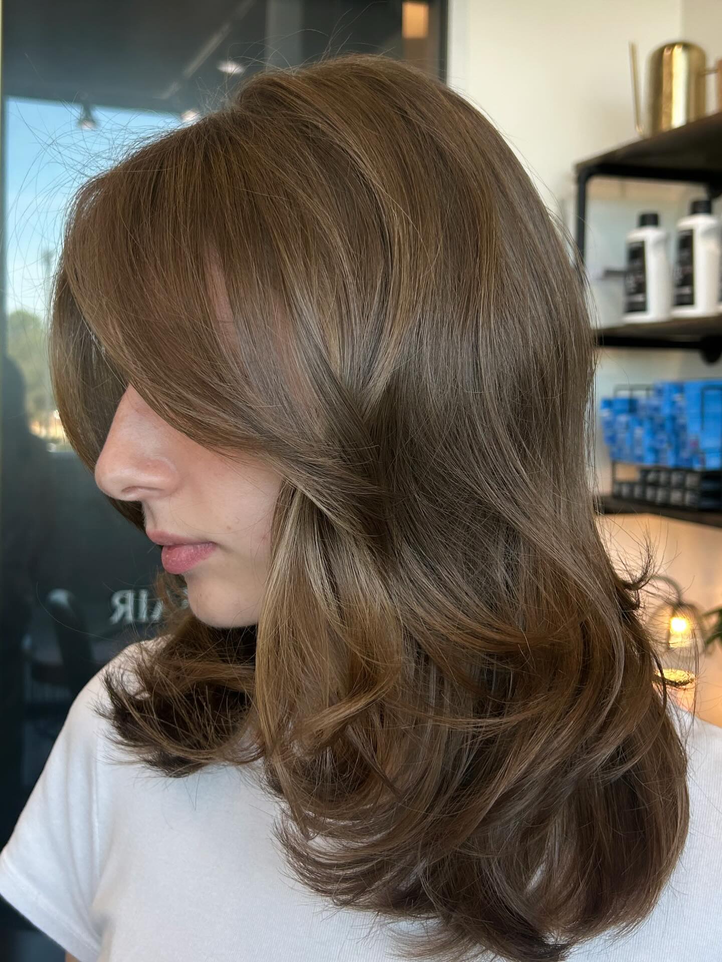 Chic Layered Medium-Length Cut with Soft Waves