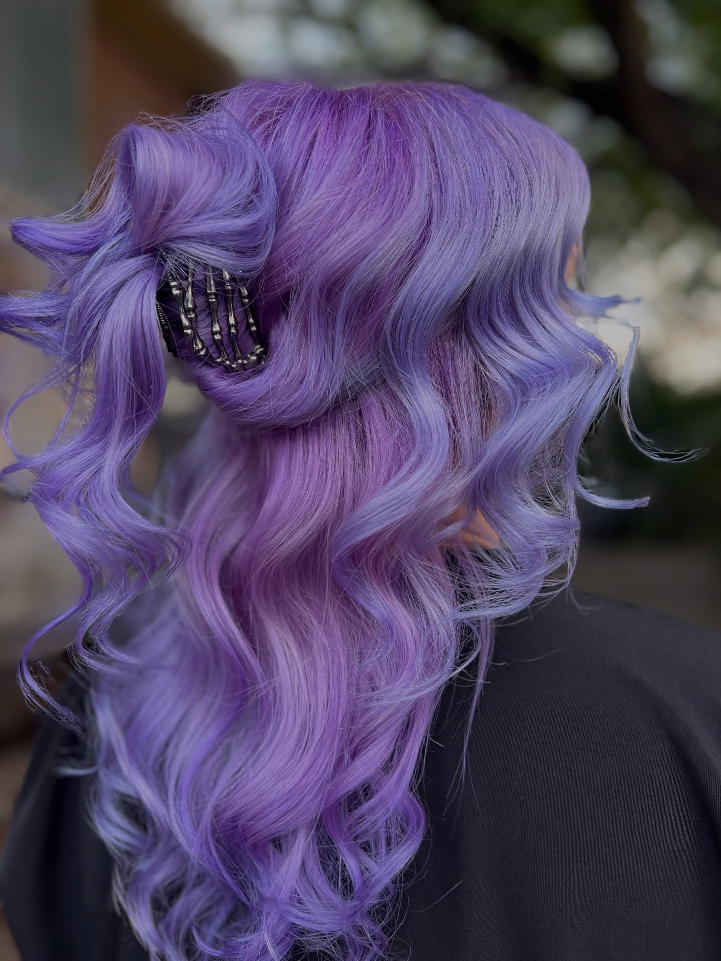 Chic Layered Purple Waves with Accent Clip