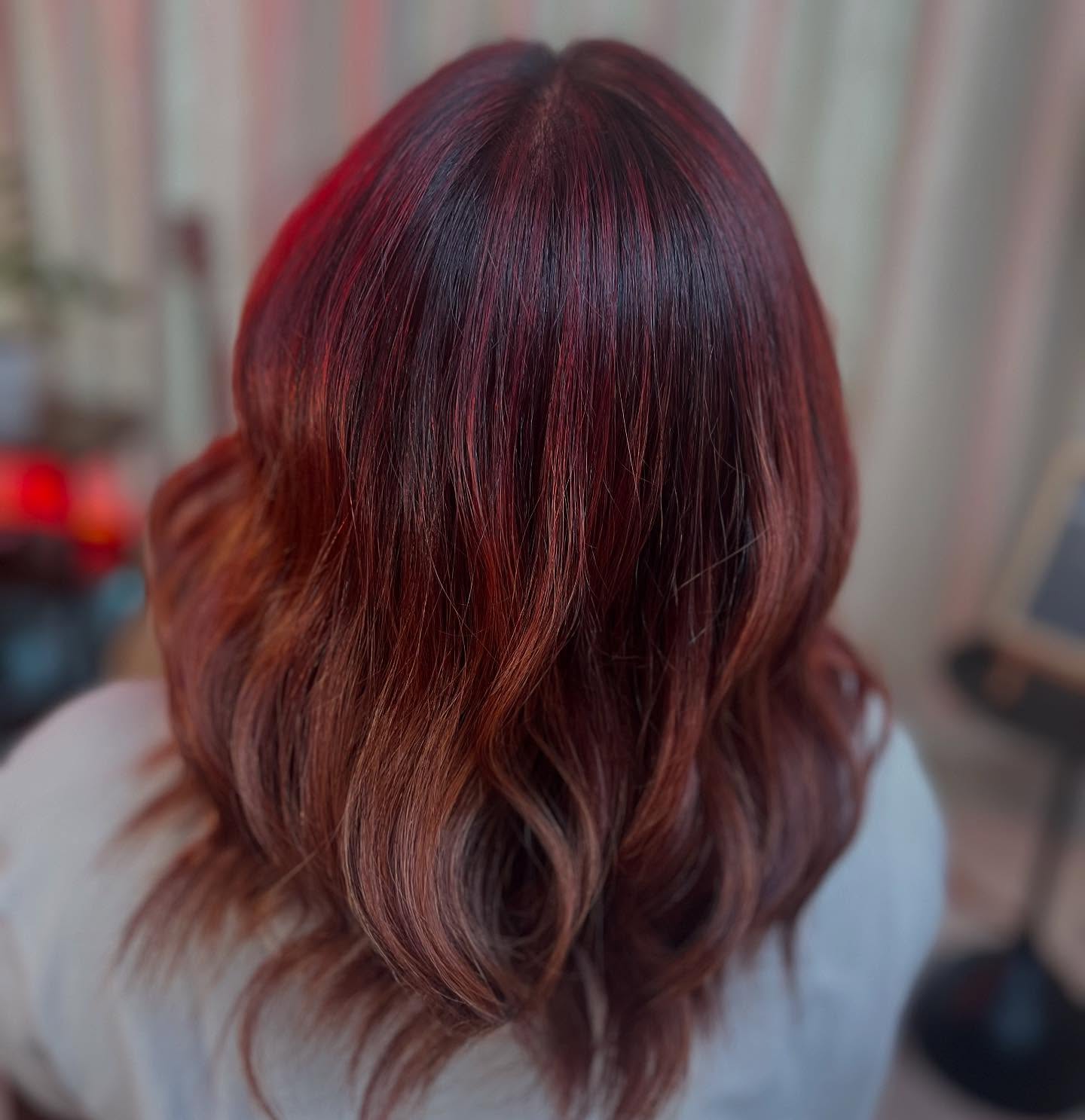 Chic Red Copper Balayage with Soft Waves