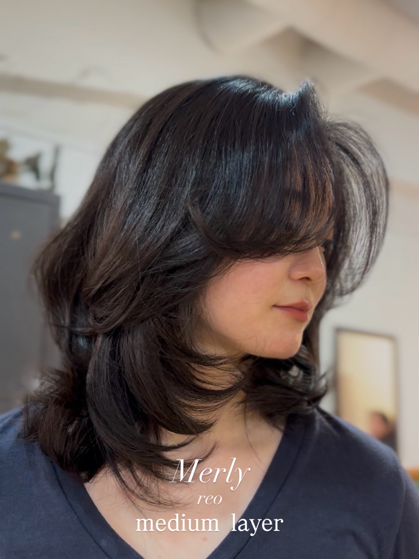 Elegant Medium-Length Layered Cut with Face-Framing Layers