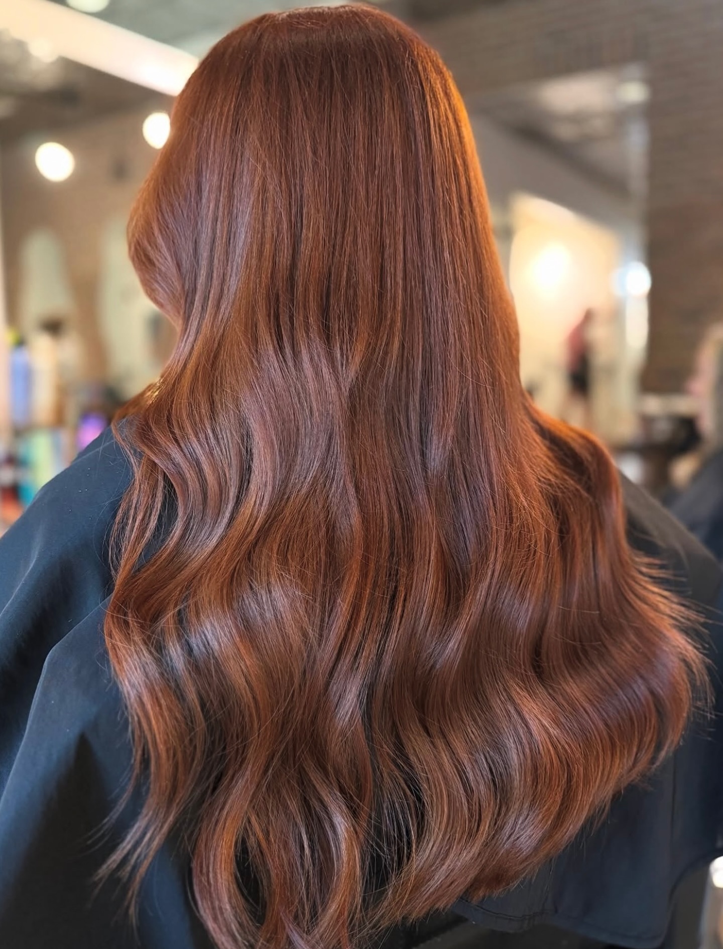 Radiant Red Copper Balayage with Soft Waves