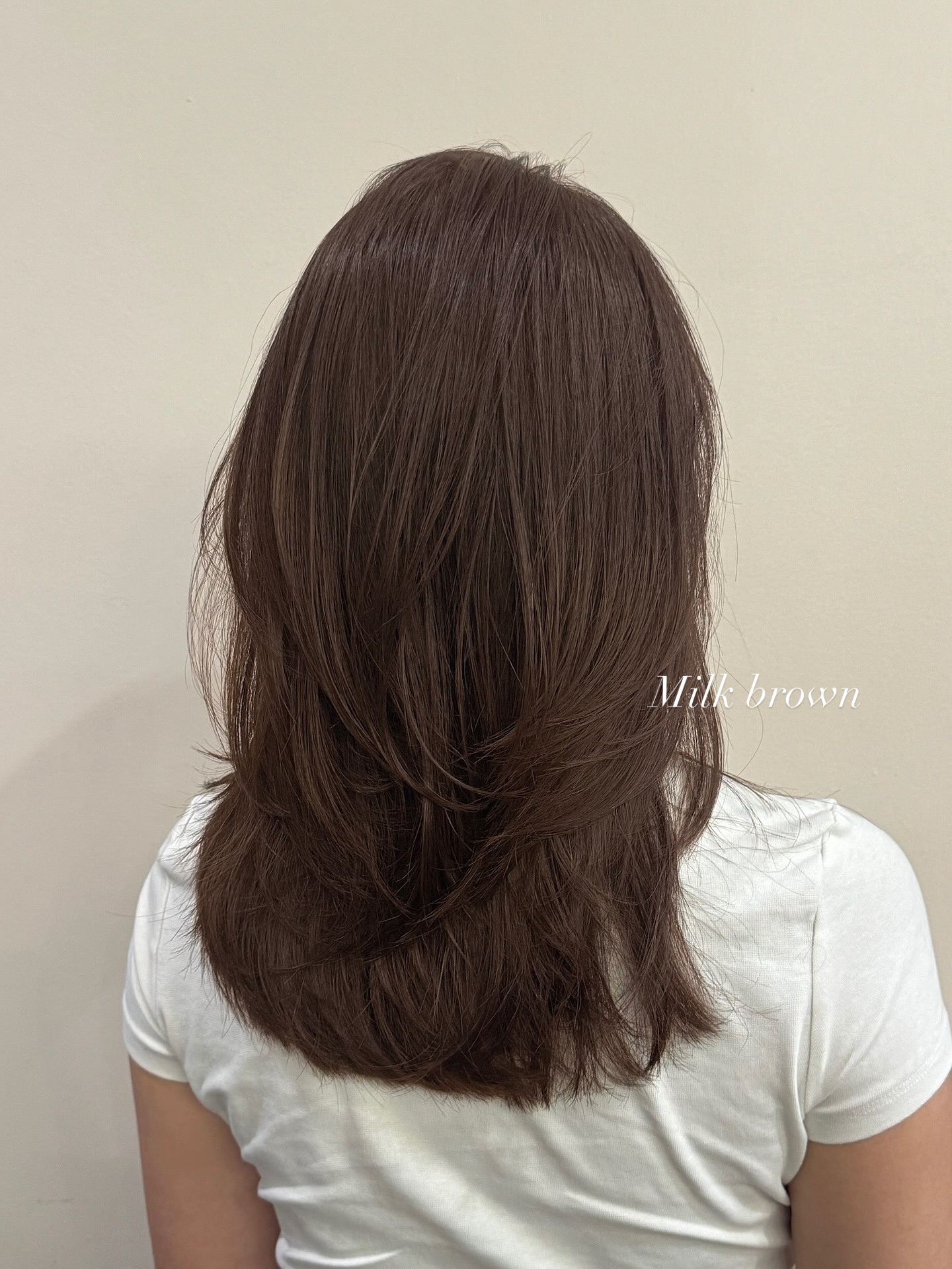 Softly Layered Medium-Length Cut with Luminous Milk Brown Tones