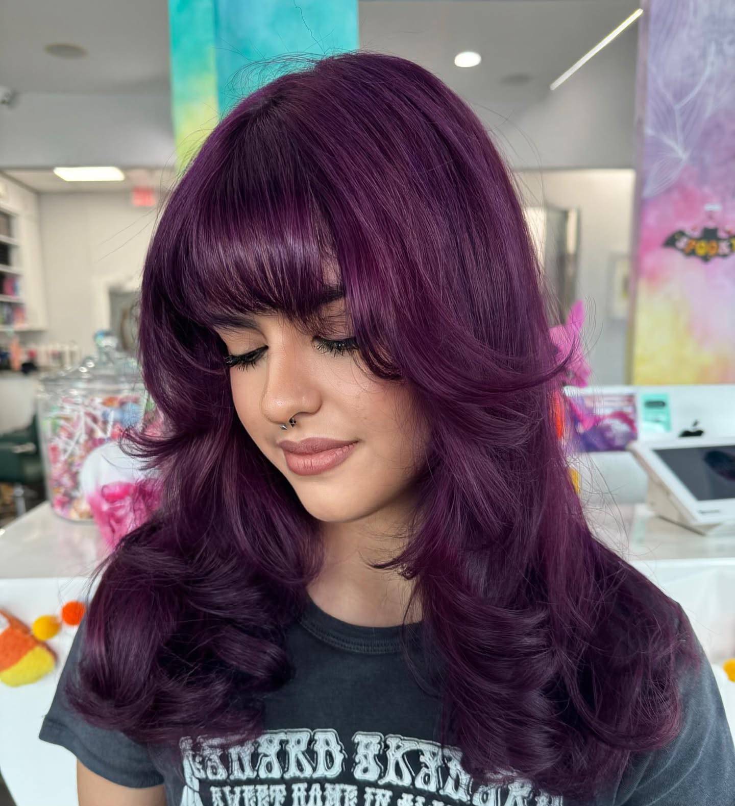 Textured Purple Layers with Face-Framing Bangs