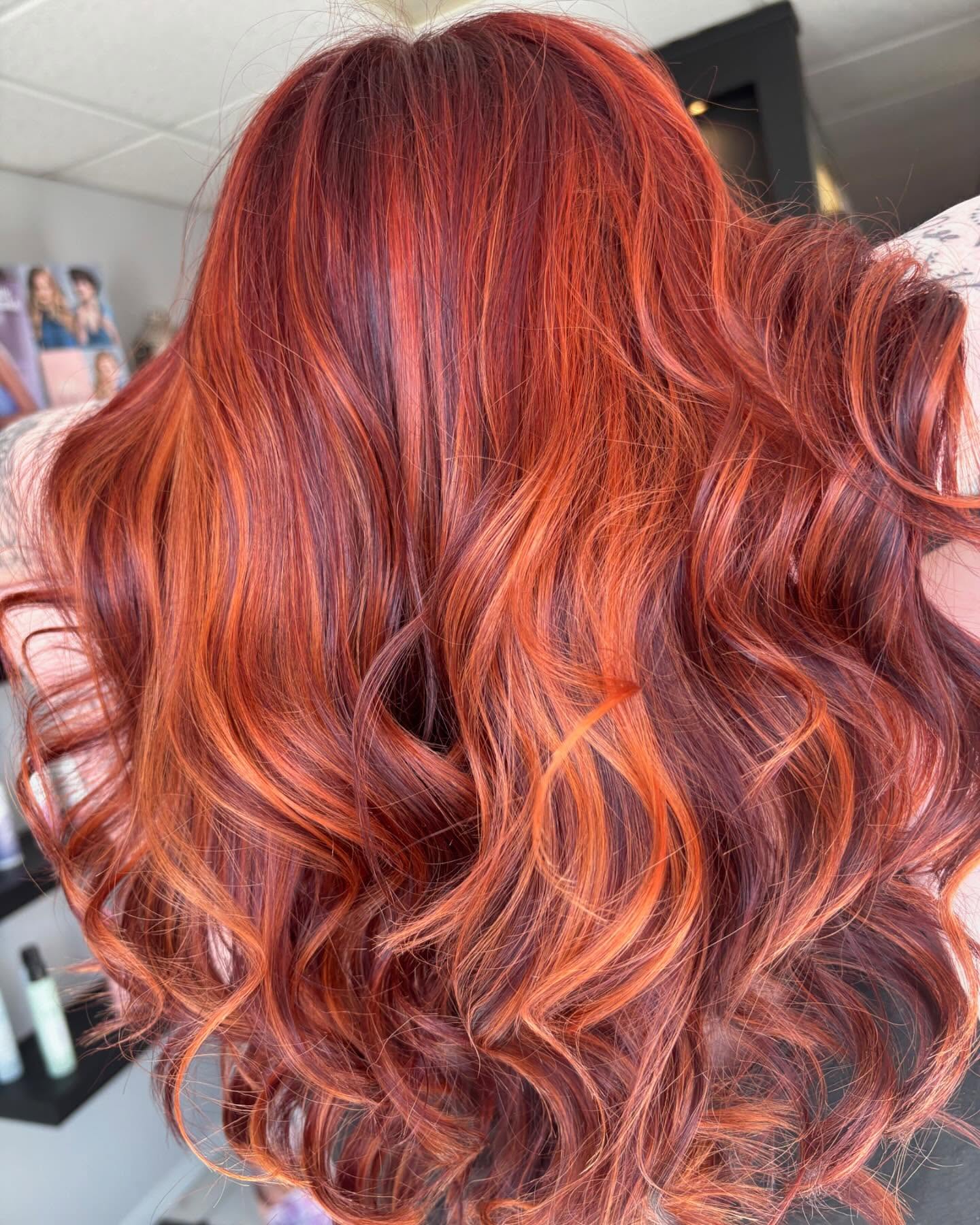 Vibrant Red Copper Balayage with Luscious Waves