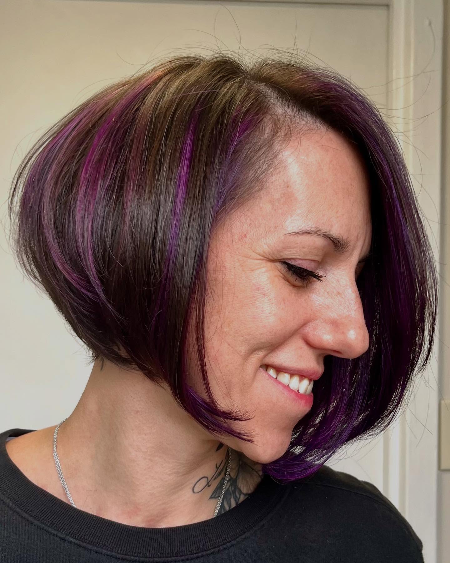 Bold Textured Bob with Vibrant Purple Highlights