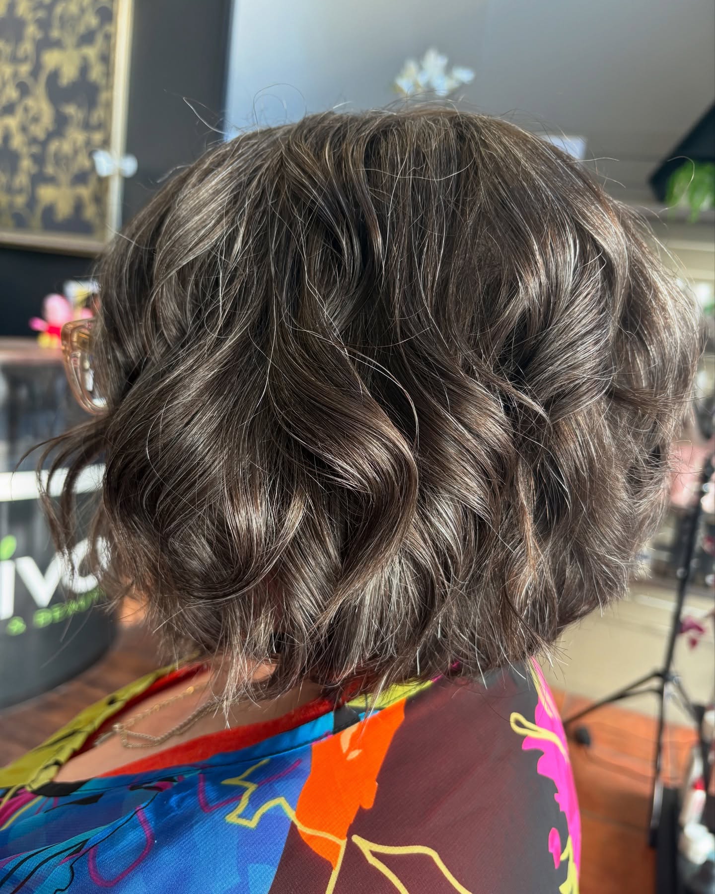 Textured Bob with Dynamic Curls and Subtle Layers