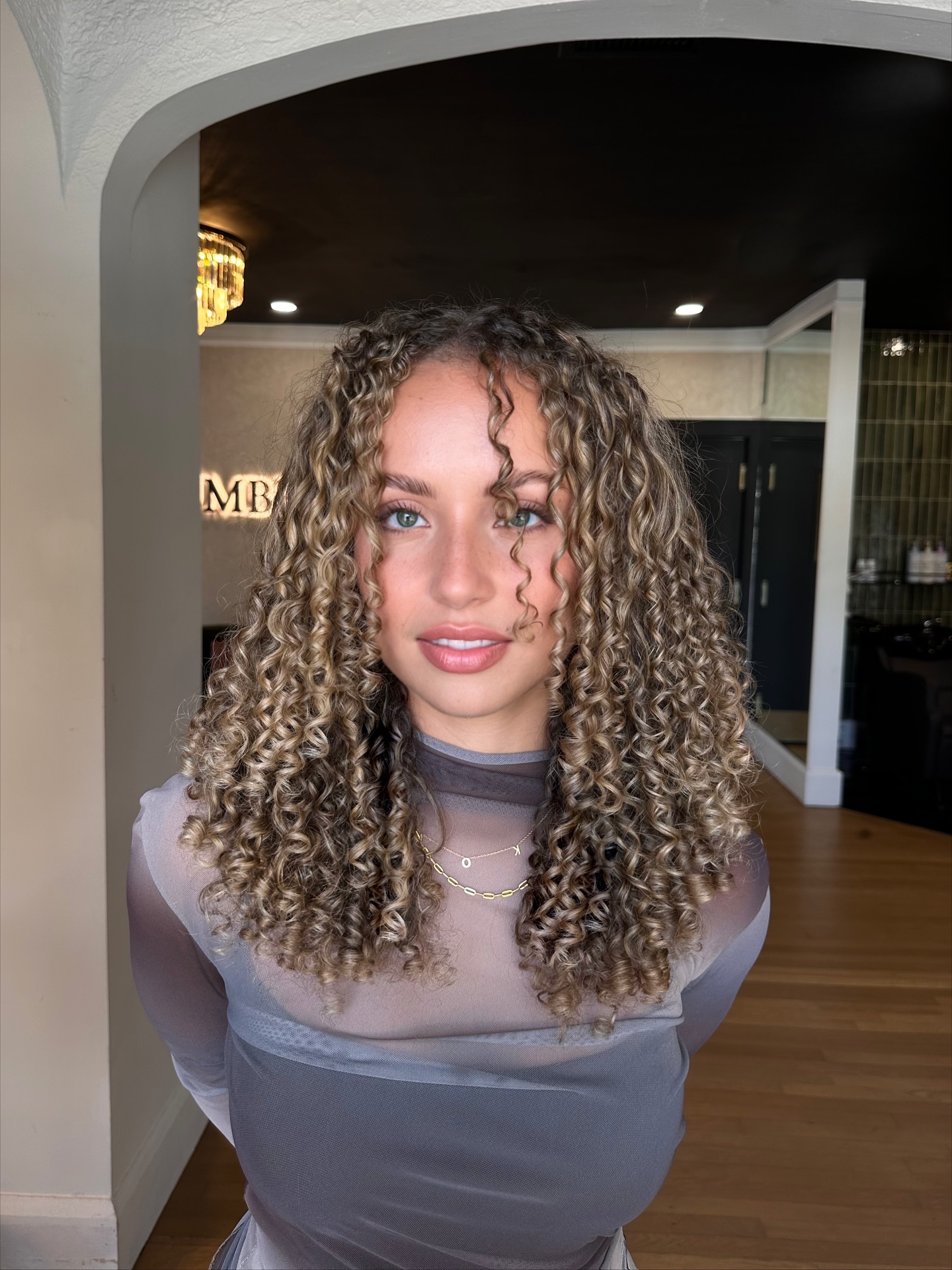 Charming Bouncy Curly Cut with Defined Curls