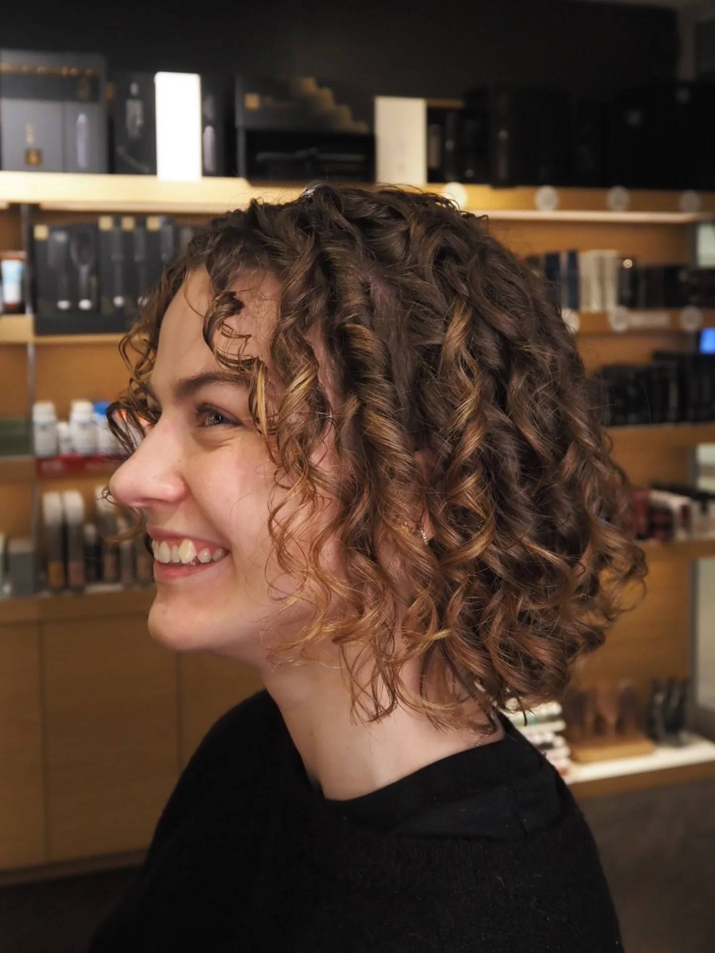 Chic Curly Bob with Soft Highlights