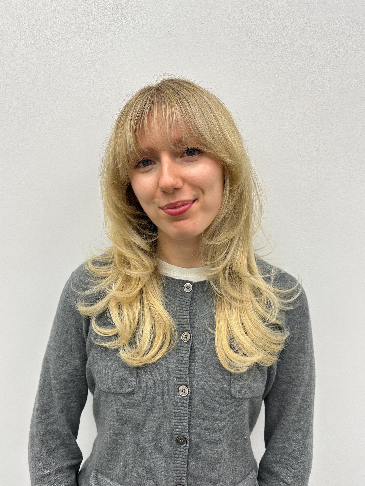 Chic Layered Cut with Face-Framing Bangs