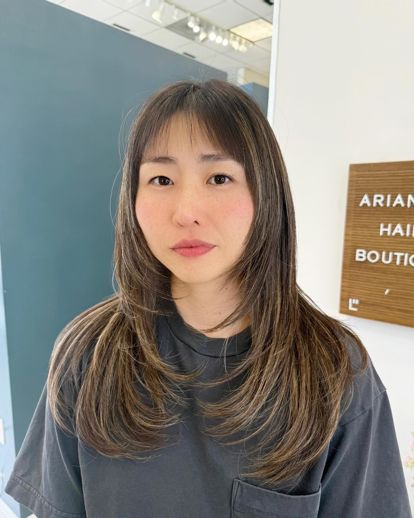 Chic Long Layers with Wispy Bangs