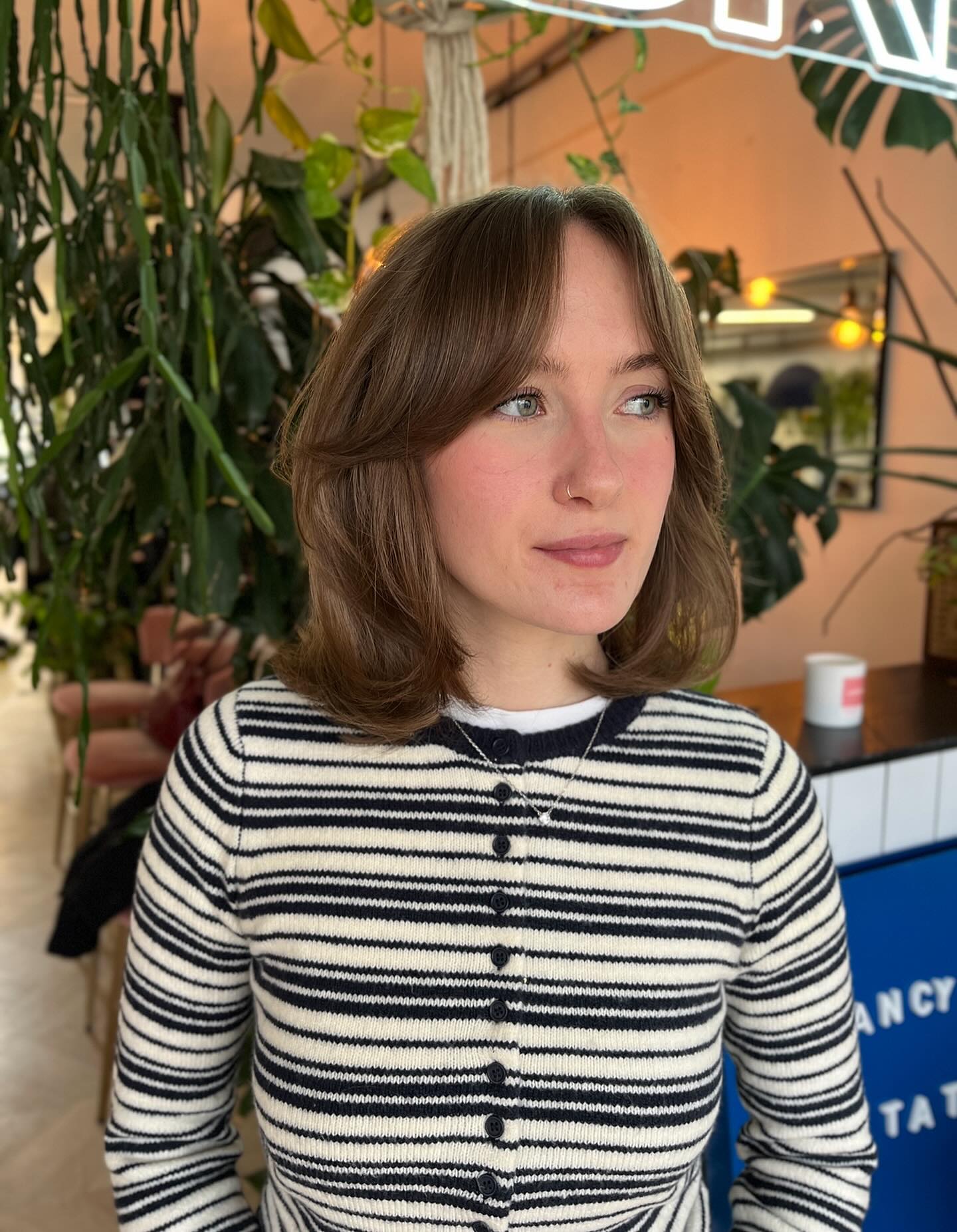 Chic Mid-Length Layered Bob with Soft Bangs